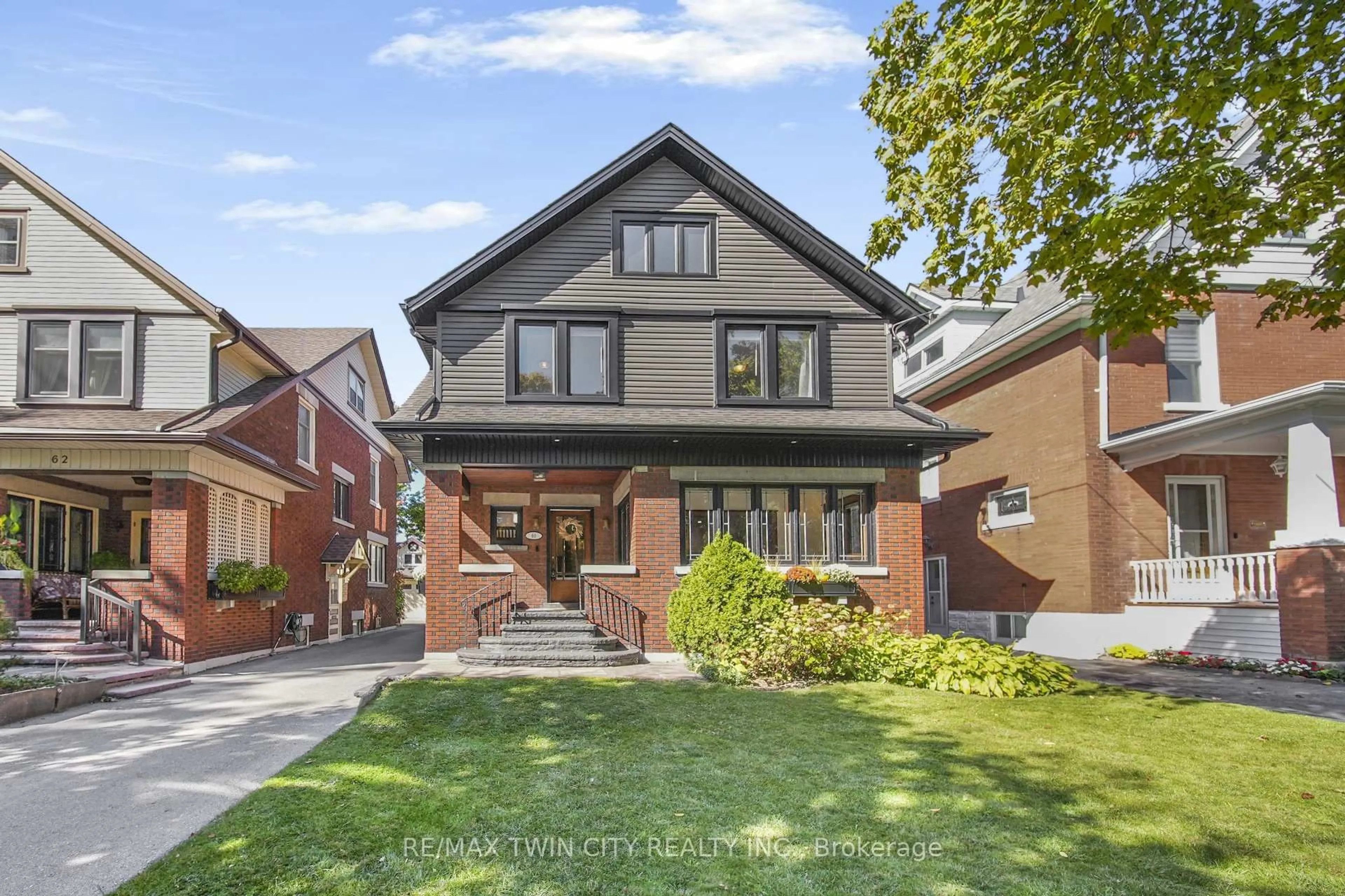 Home with brick exterior material, street for 60 Heins Ave, Kitchener Ontario N2G 1Z8