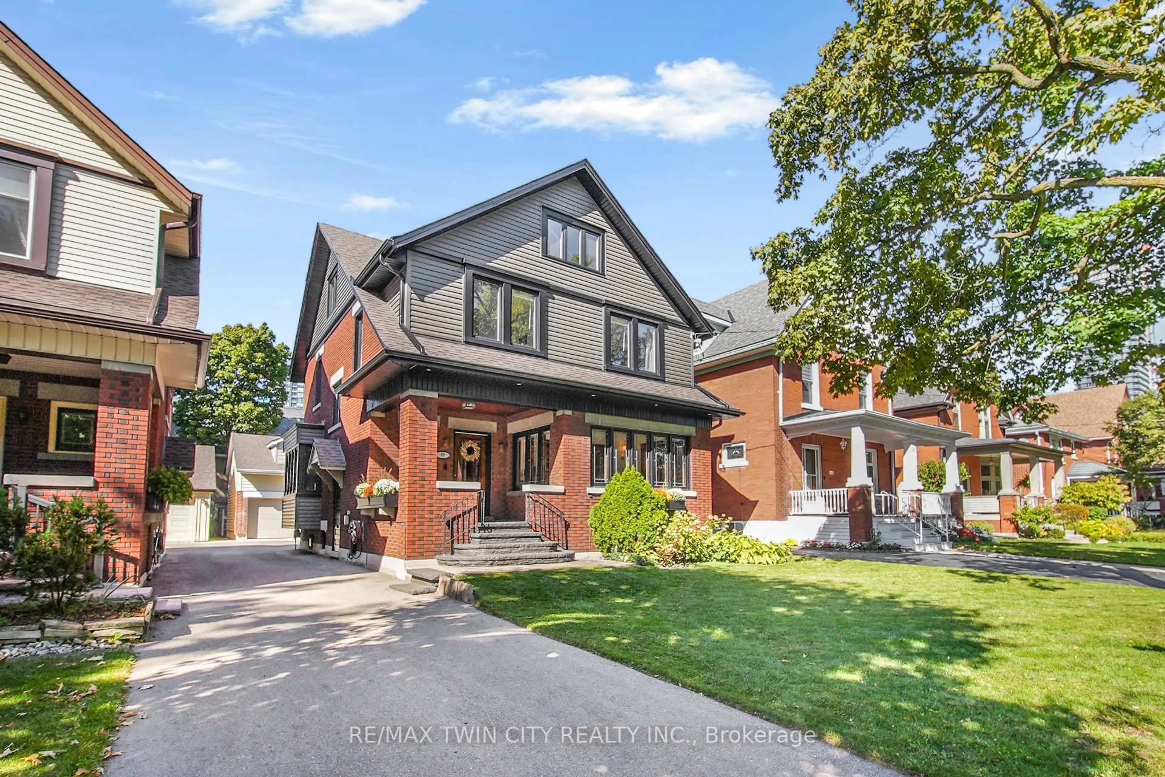 Home with brick exterior material, street for 60 Heins Ave, Kitchener Ontario N2G 1Z8