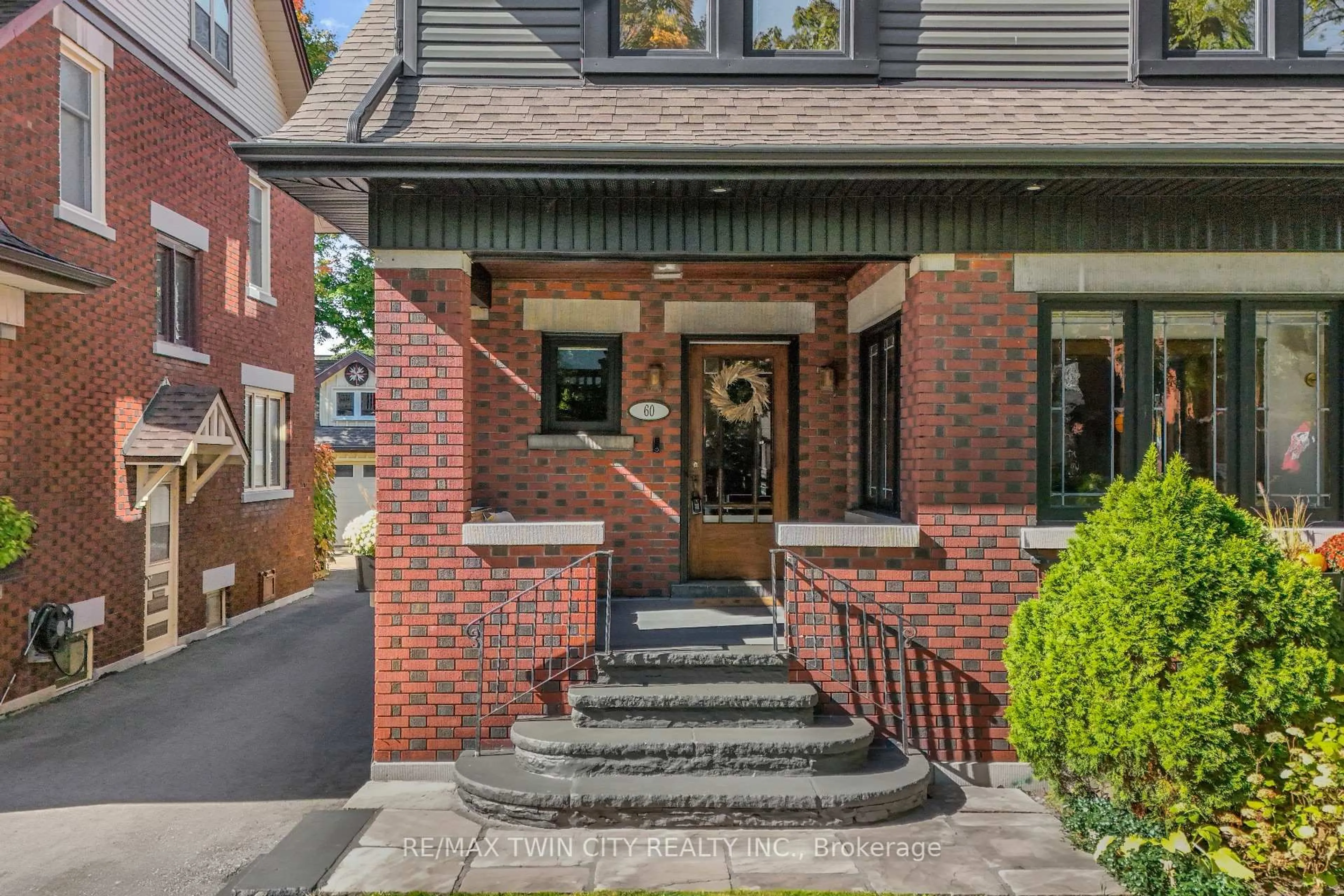 Home with brick exterior material, street for 60 Heins Ave, Kitchener Ontario N2G 1Z8