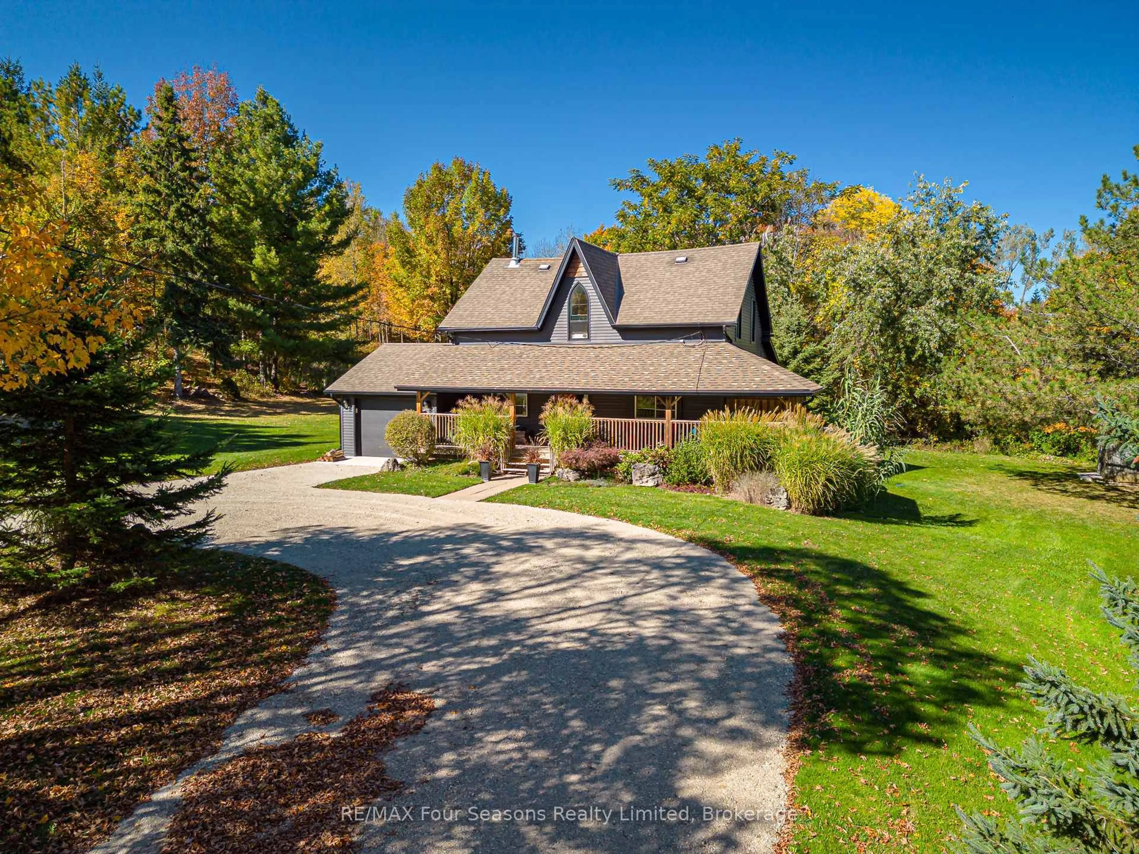 A pic from outside/outdoor area/front of a property/back of a property/a pic from drone, street for 686267 19 Sdrd, Grey Highlands Ontario N4L 1W7