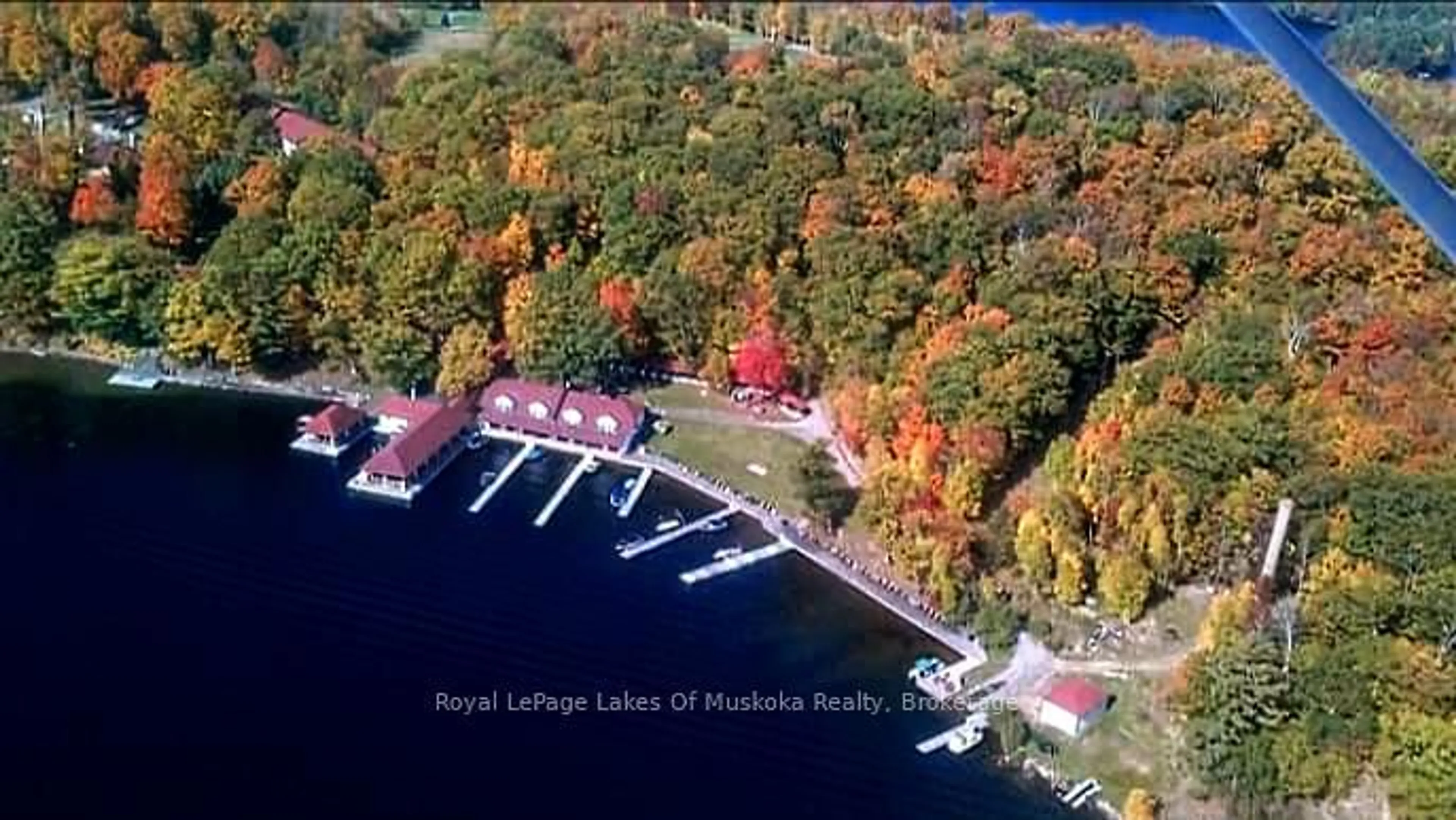 A pic from outside/outdoor area/front of a property/back of a property/a pic from drone, water/lake/river/ocean view for 12 Bigwin Island Island #307, Lake of Bays Ontario P0A 1E0