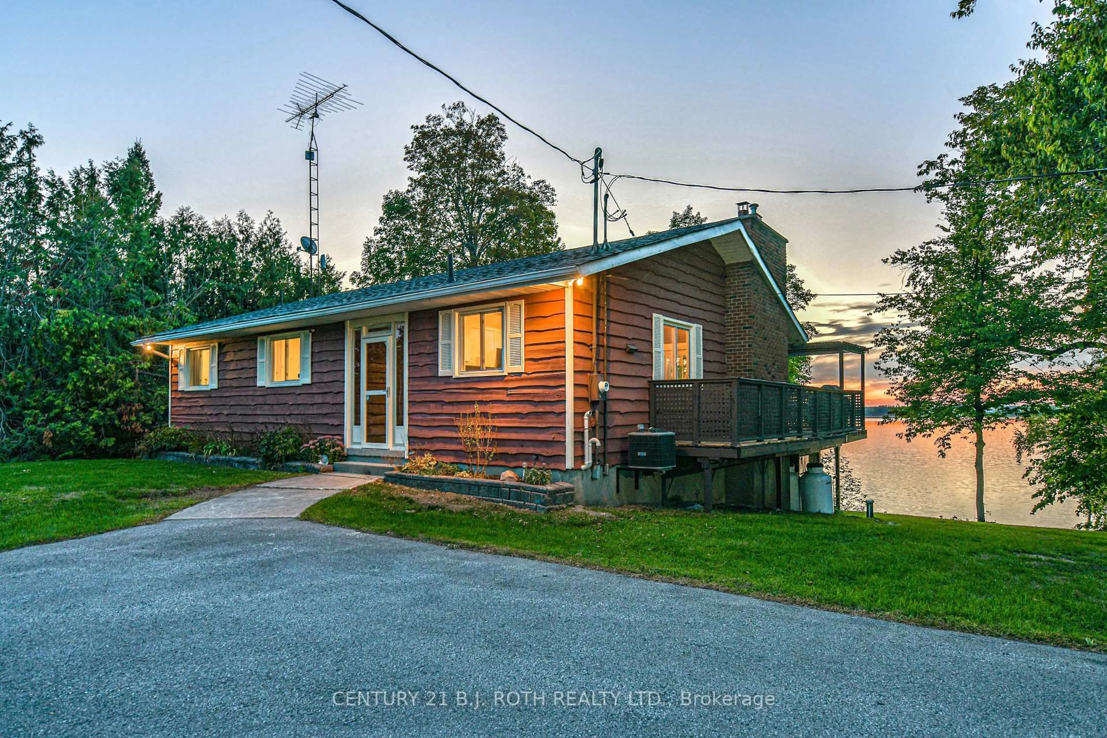 A pic from outside/outdoor area/front of a property/back of a property/a pic from drone, water/lake/river/ocean view for 71 Campbell Beach Rd, Kawartha Lakes Ontario L0K 1B0