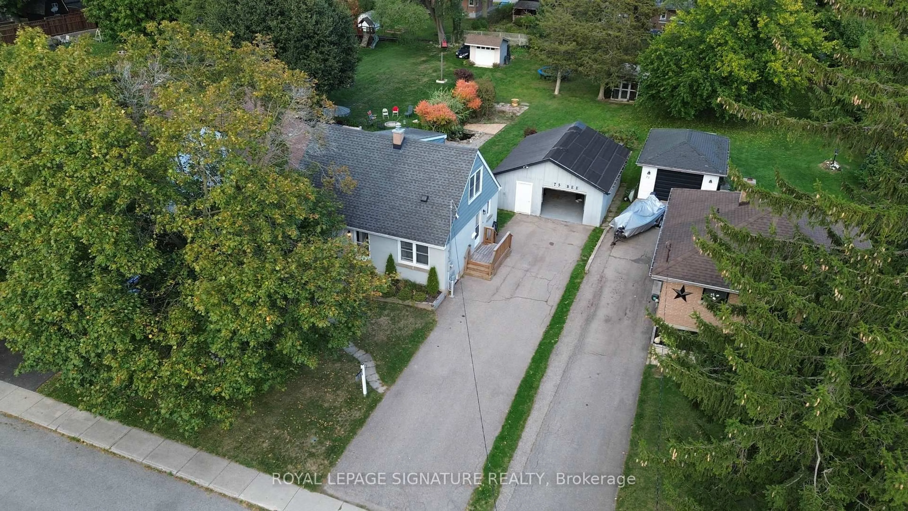 A pic from outside/outdoor area/front of a property/back of a property/a pic from drone, street for 73 Bee St, Woodstock Ontario N4S 3Z2