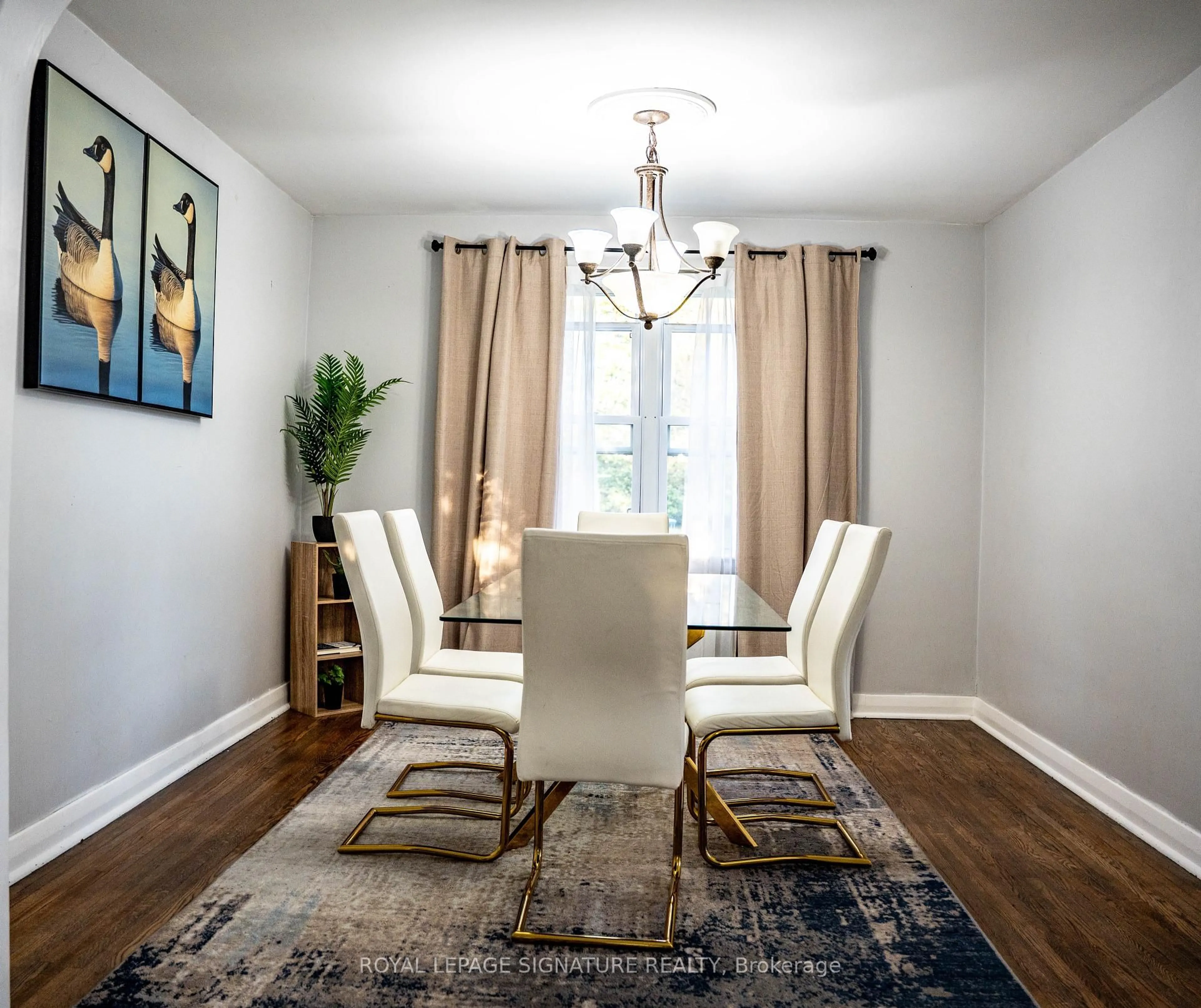 Dining room, wood/laminate floor for 73 Bee St, Woodstock Ontario N4S 3Z2