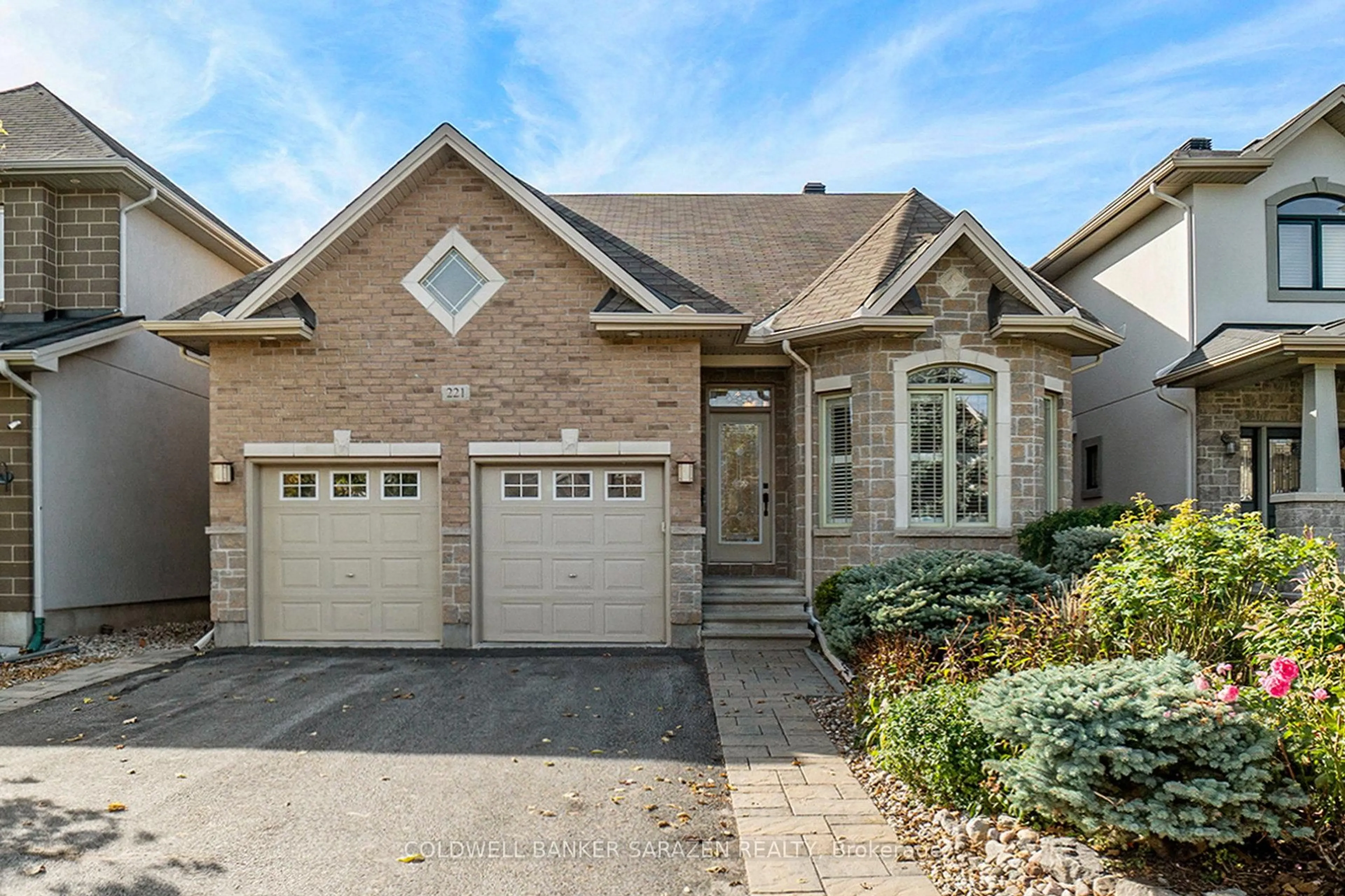Home with brick exterior material, street for 221 Madhu Cres, Ottawa Ontario K2C 4J2