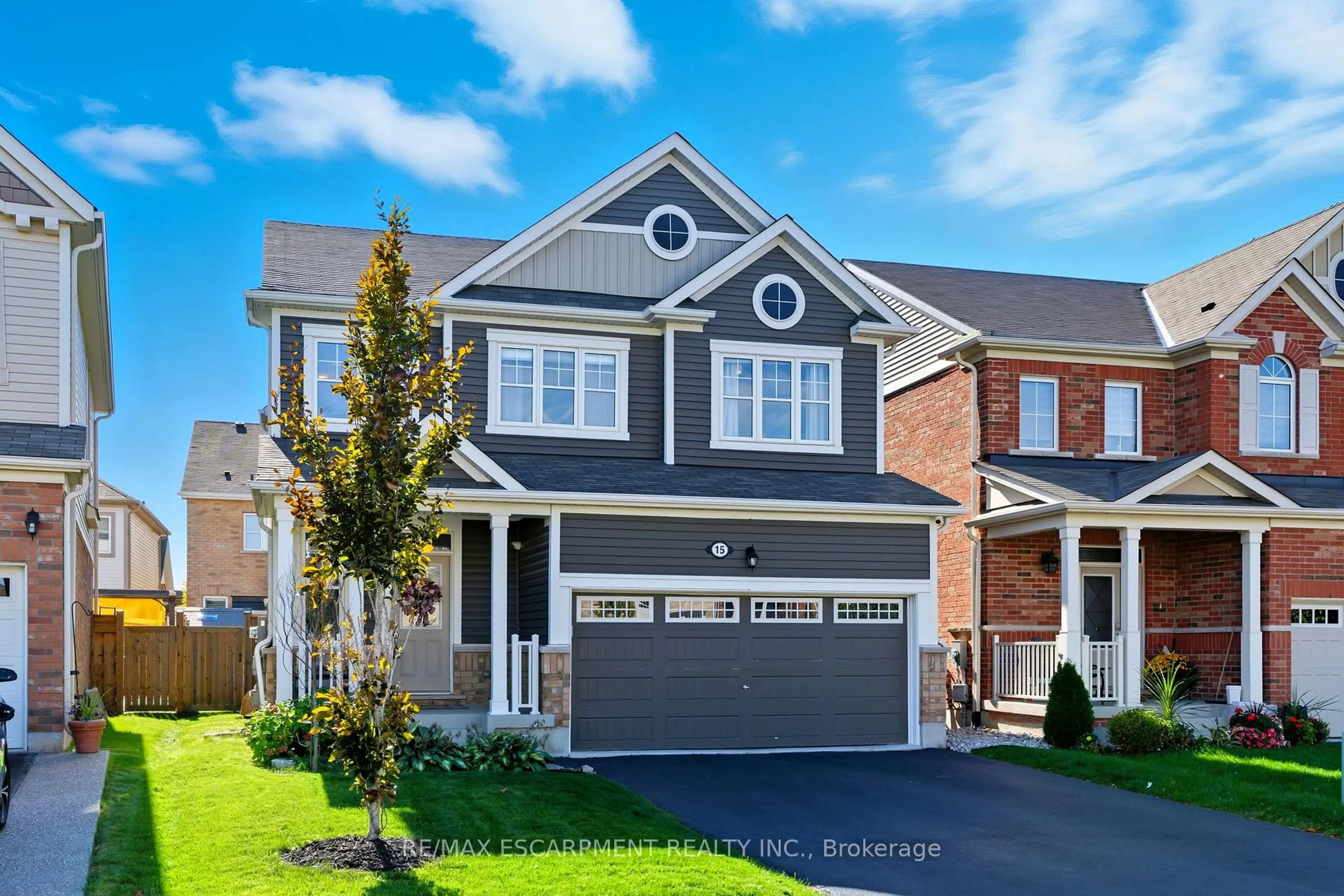 Home with vinyl exterior material, street for 15 Bastia St, Hamilton Ontario L8B 1V3