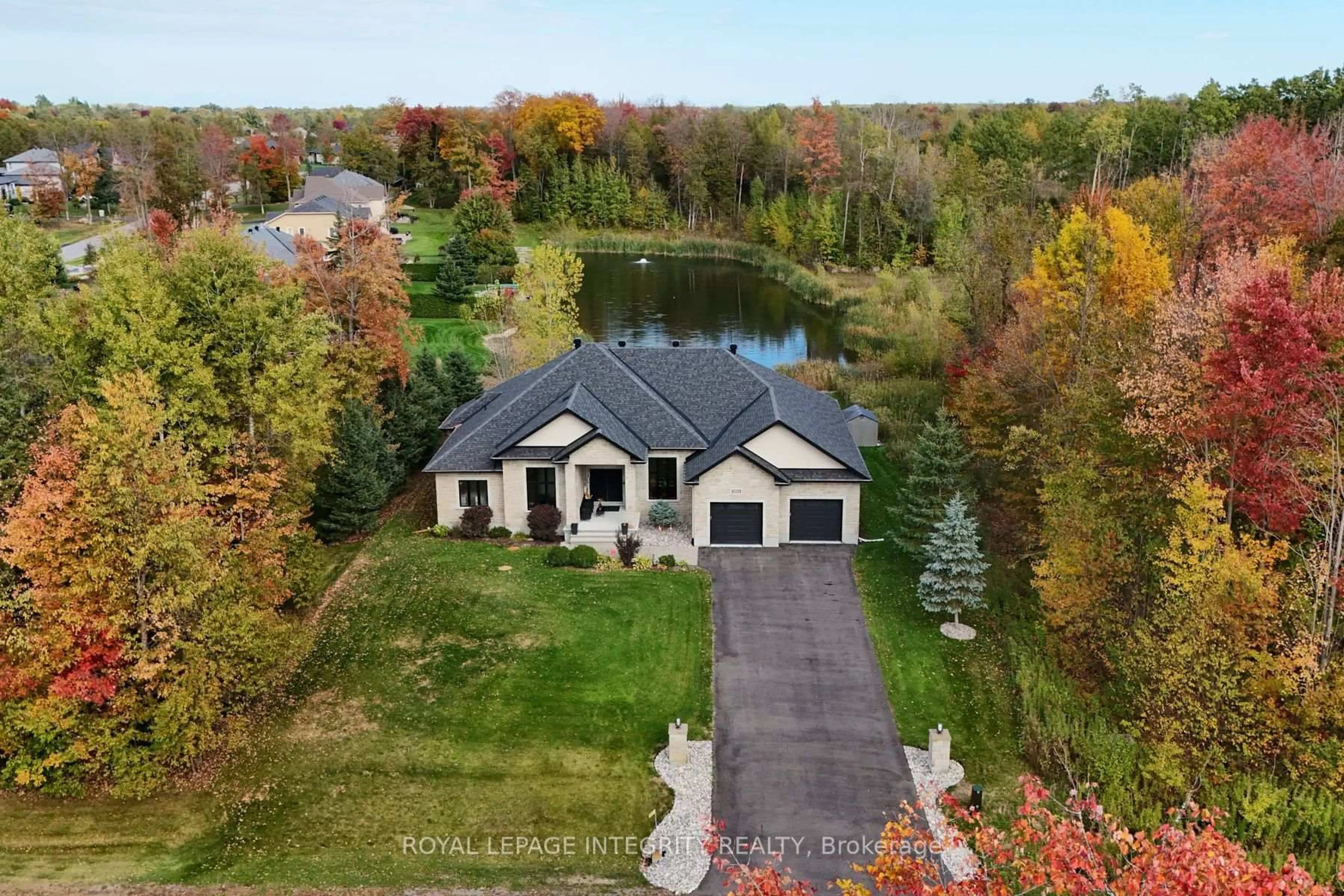 A pic from outside/outdoor area/front of a property/back of a property/a pic from drone, water/lake/river/ocean view for 1954 Cedarlakes Way, Ottawa Ontario K4P 0E4