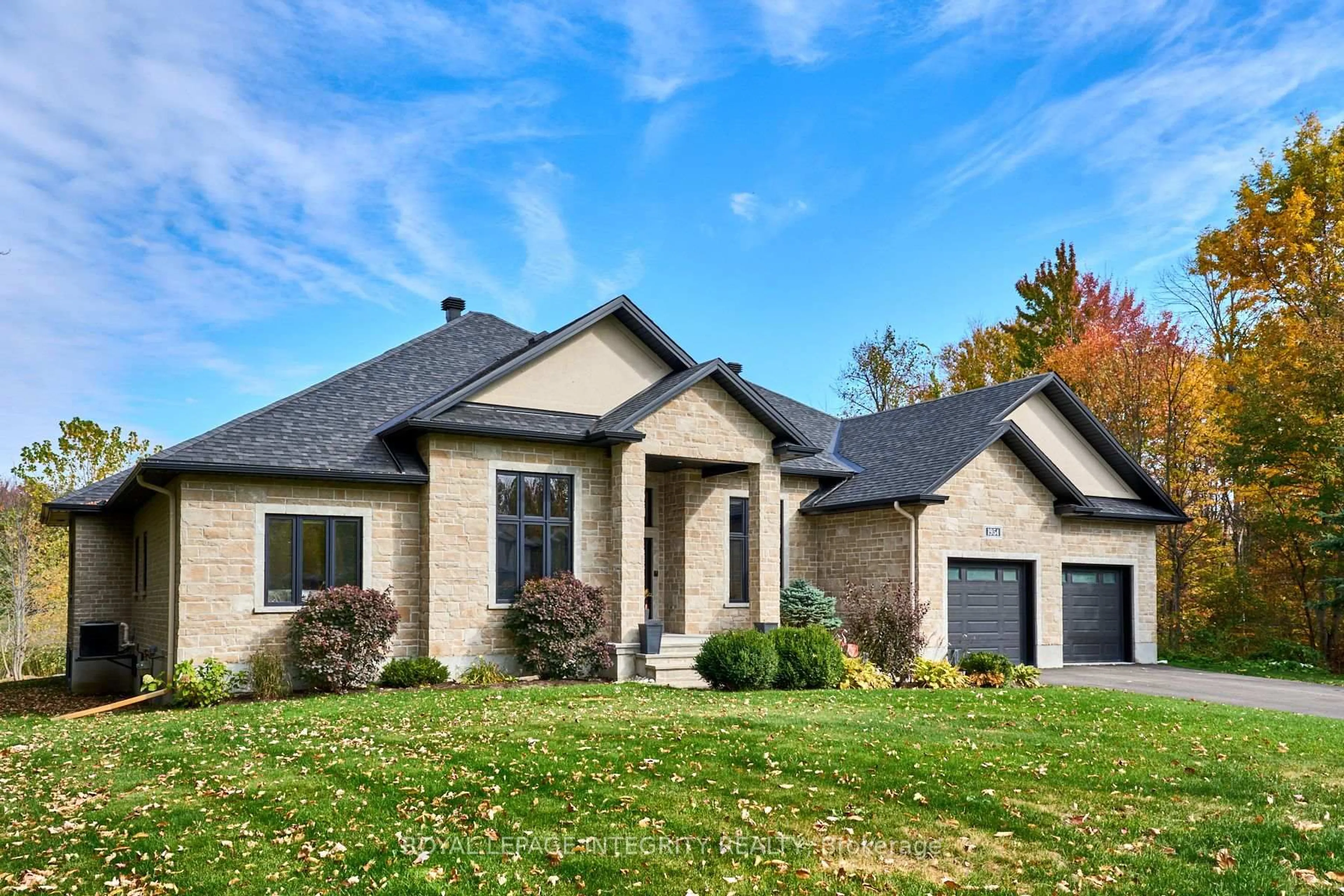 Home with brick exterior material, street for 1954 Cedarlakes Way, Ottawa Ontario K4P 0E4