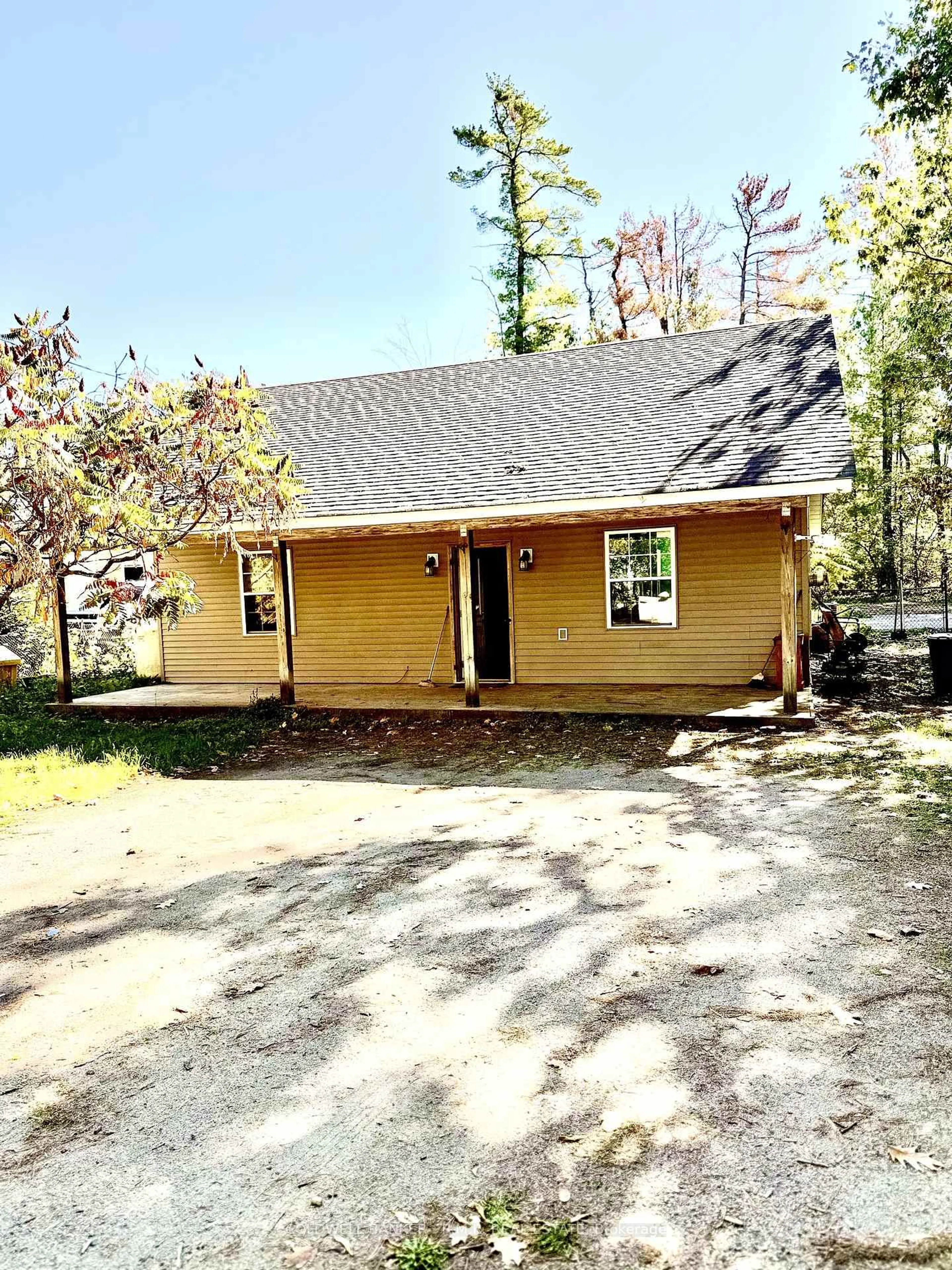 Home with vinyl exterior material, street for 2 Oakwood Dr, Kawartha Lakes Ontario K0M 1N0