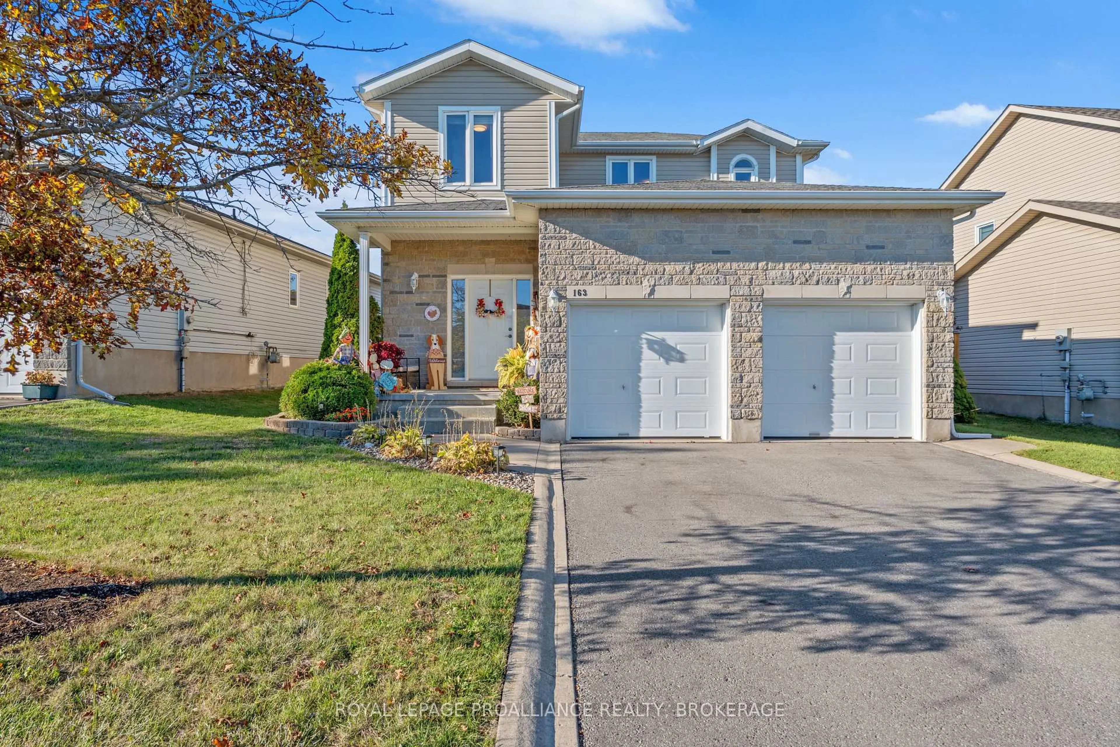 Home with vinyl exterior material, street for 163 Kildare Ave, Loyalist Ontario K7N 0A1