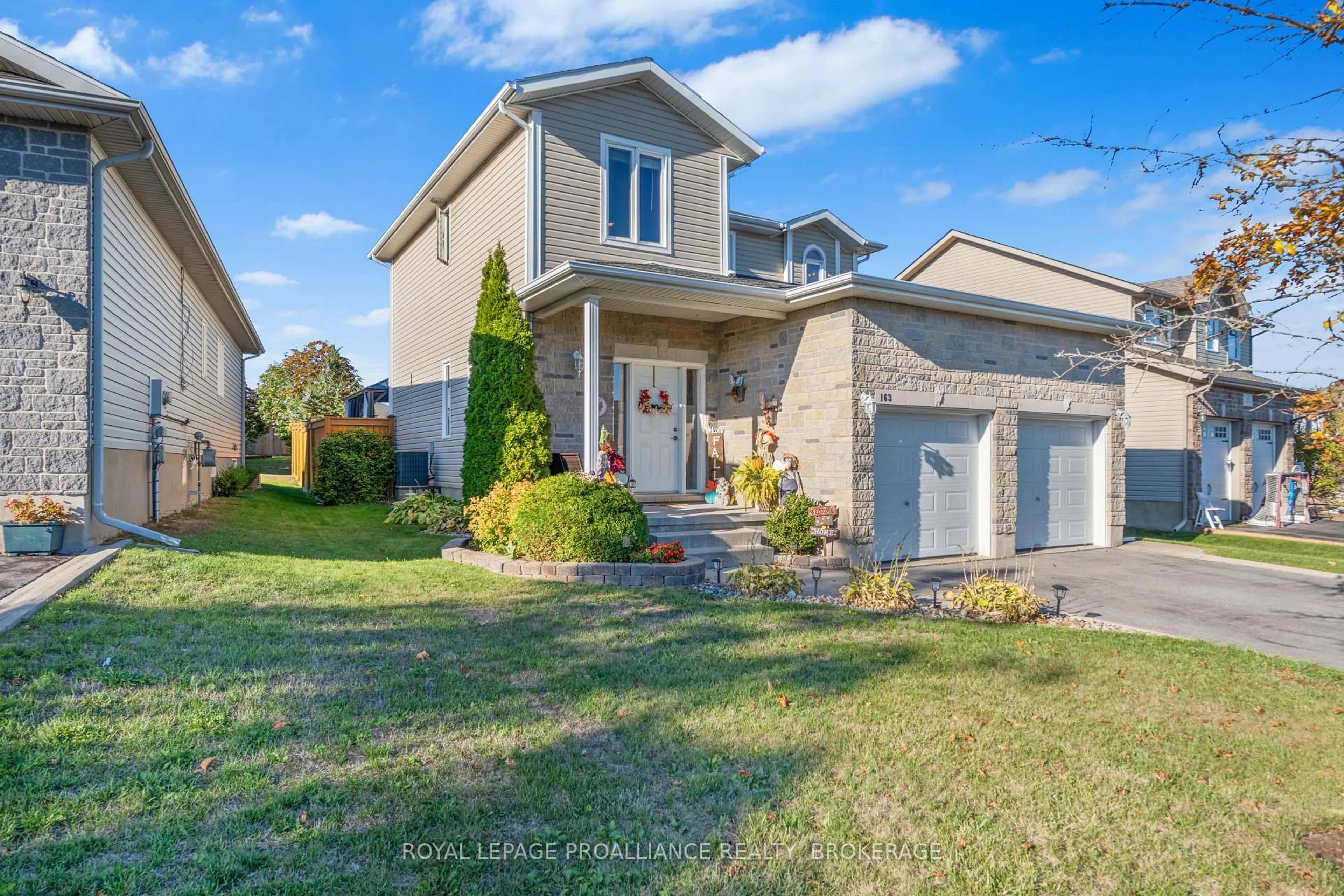 Home with vinyl exterior material, street for 163 Kildare Ave, Loyalist Ontario K7N 0A1