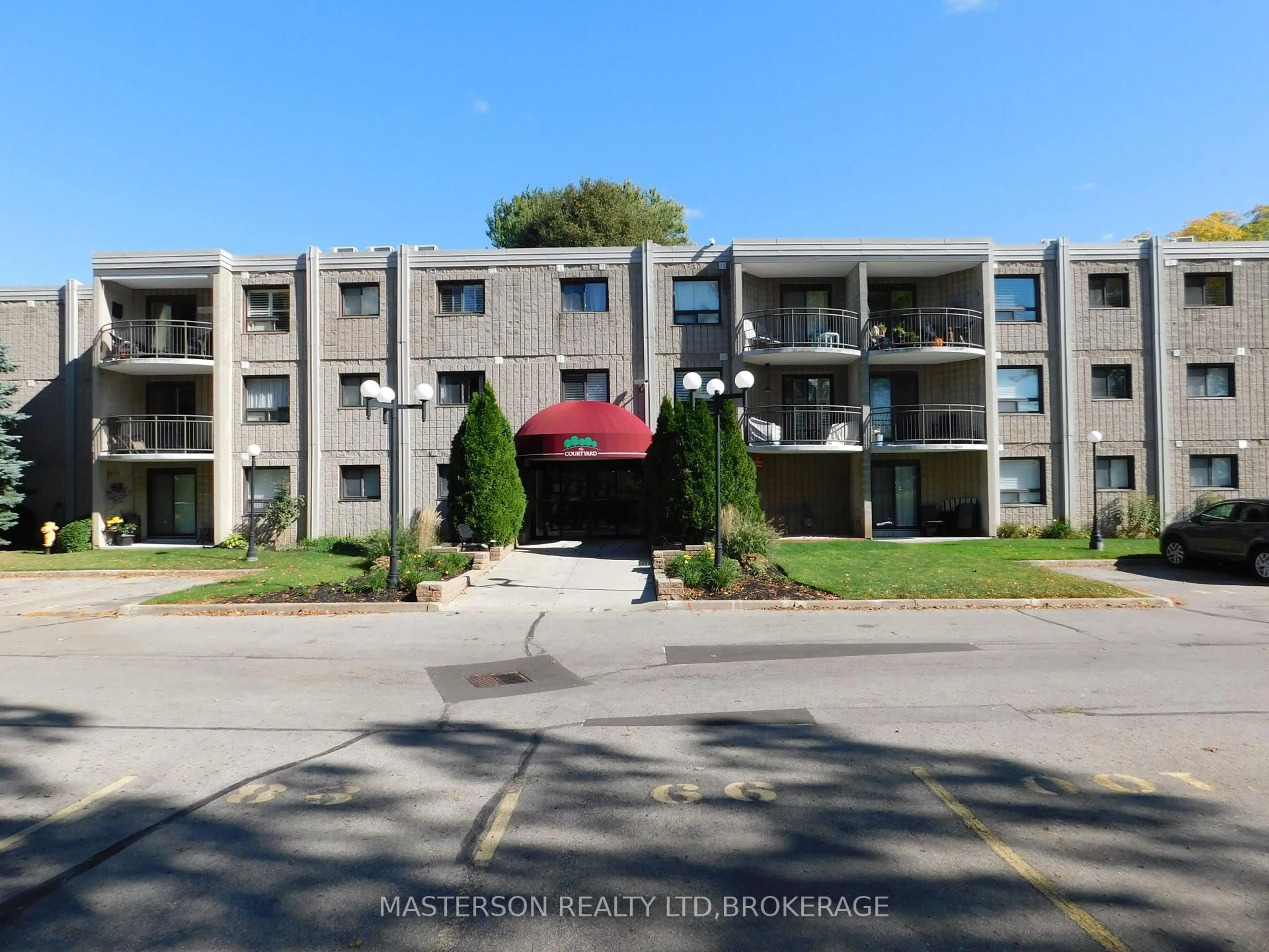 A pic from outside/outdoor area/front of a property/back of a property/a pic from drone, unknown for 4658 Drummond Rd #328, Niagara Falls Ontario L2E 7E1