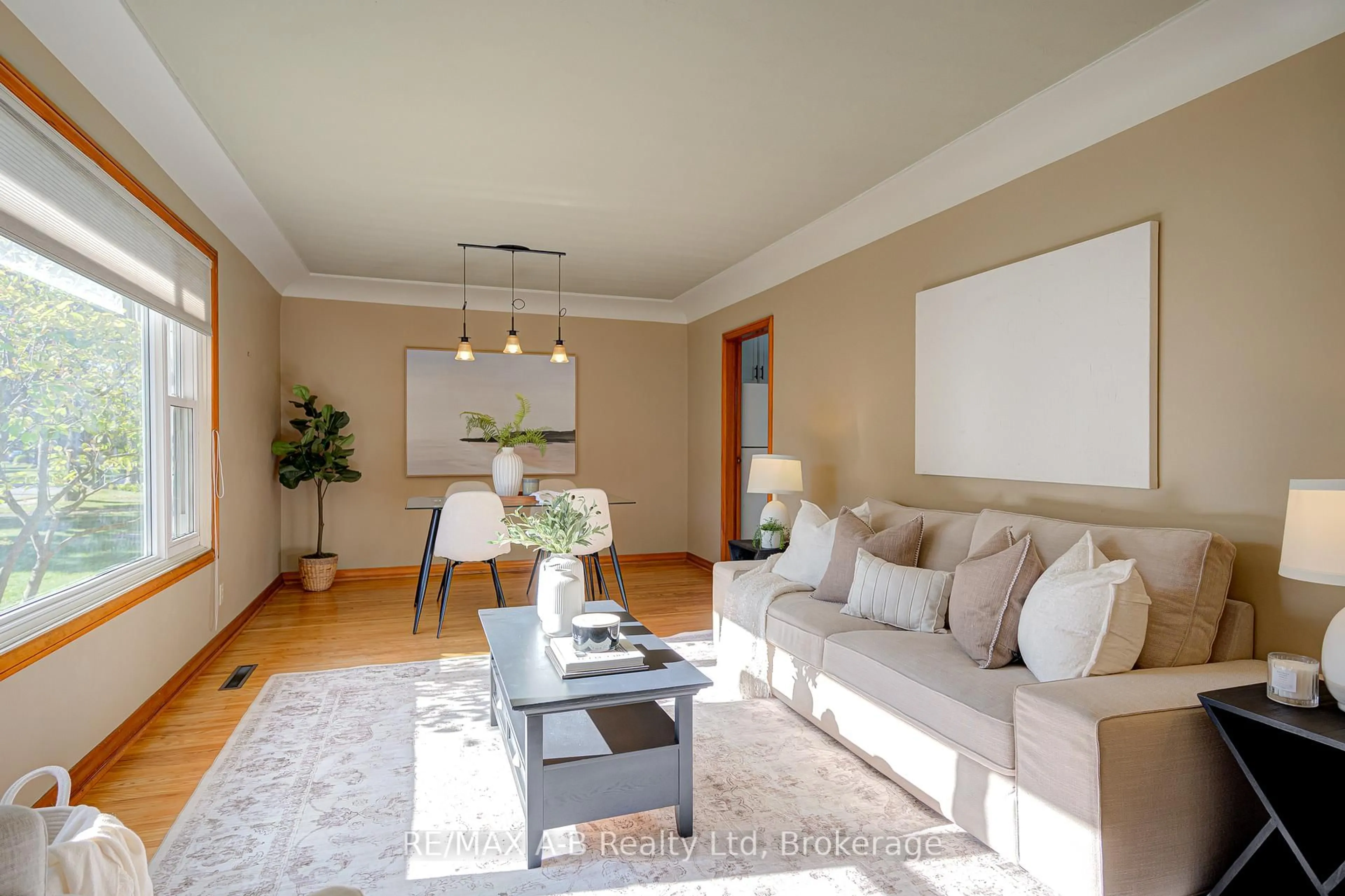 Living room with furniture, wood/laminate floor for 252 HIBERNIA St, Stratford Ontario N5A 5V7