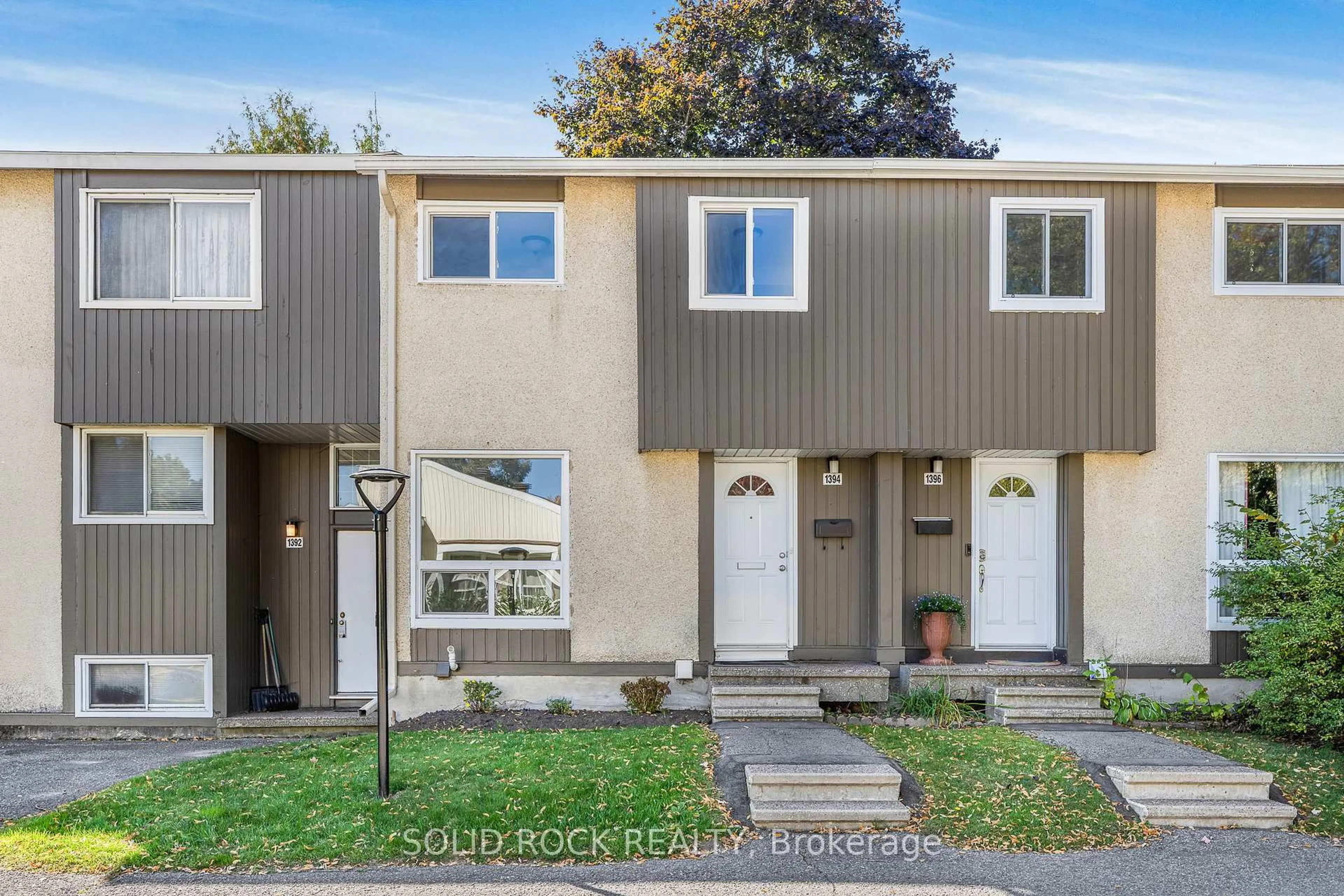 Home with vinyl exterior material, street for 1394 Lassiter Terr, Ottawa Ontario K1J 8N3