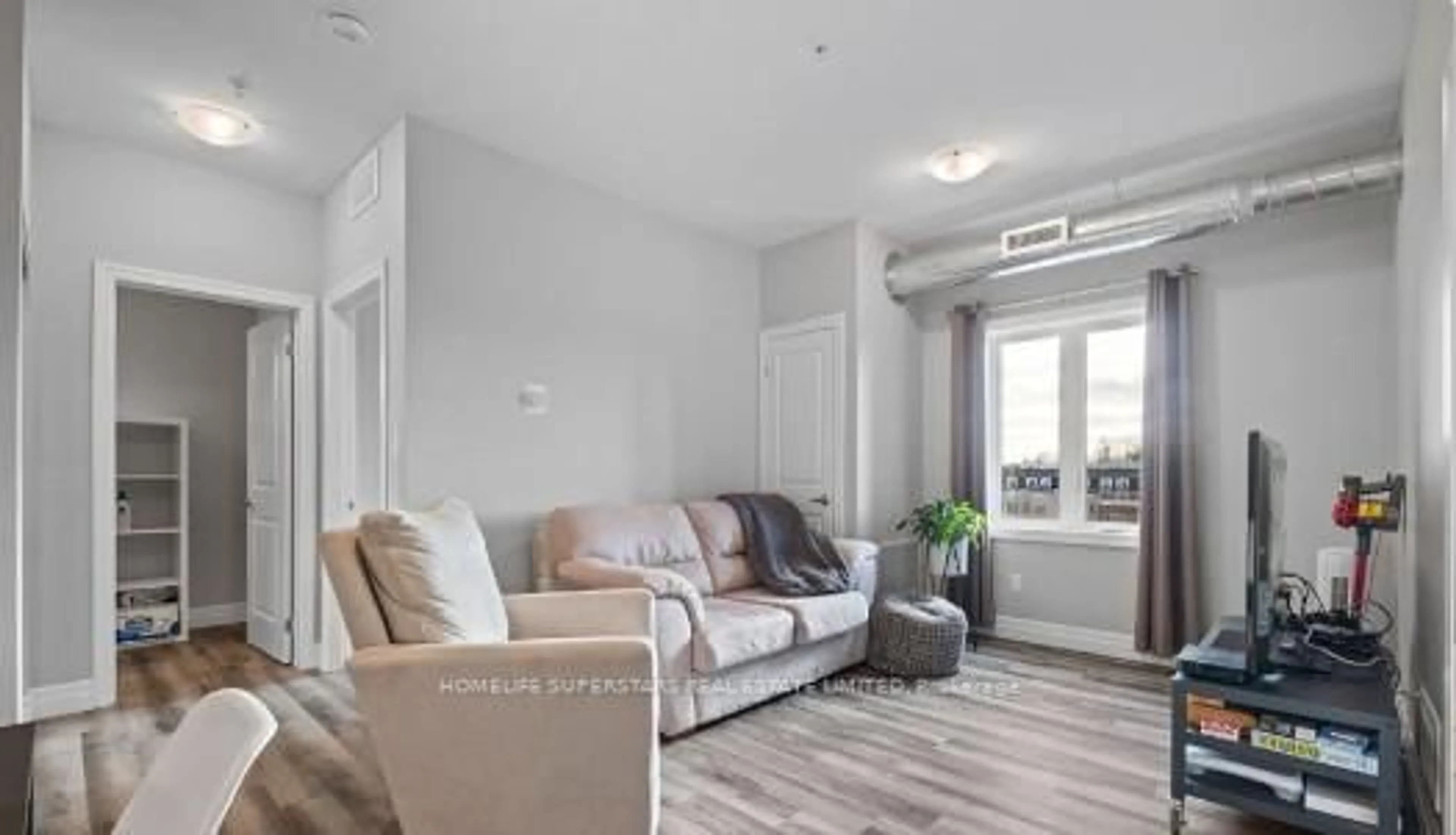 Living room with furniture, unknown for 501 Frontenac St #104, Kingston Ontario K7K 4L9