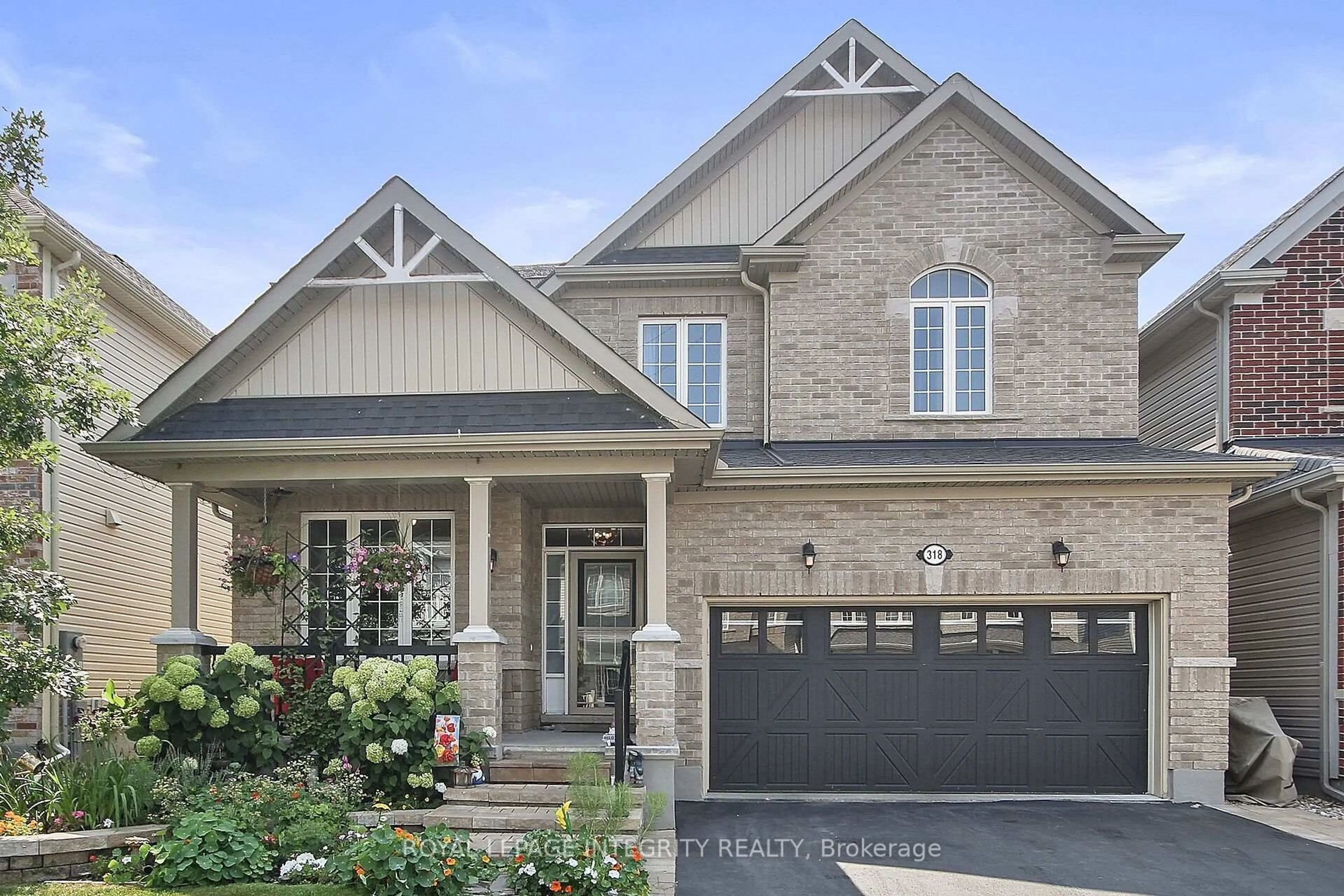 Home with brick exterior material, street for 318 Everglade Way Way, Ottawa Ontario K2M 0K9