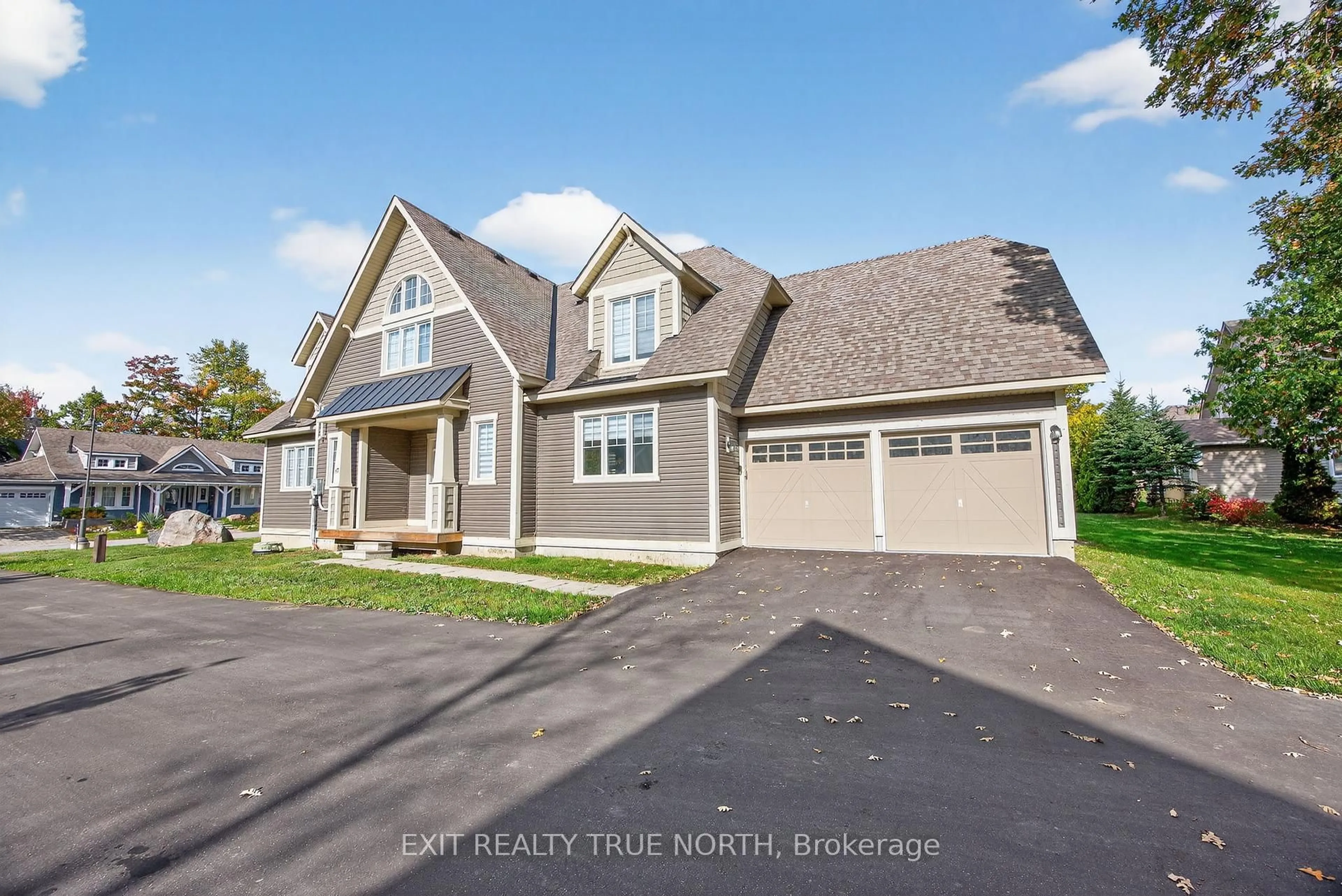 Home with vinyl exterior material, street for 47 Marina Village Dr, Georgian Bay Ontario L0K 1S0
