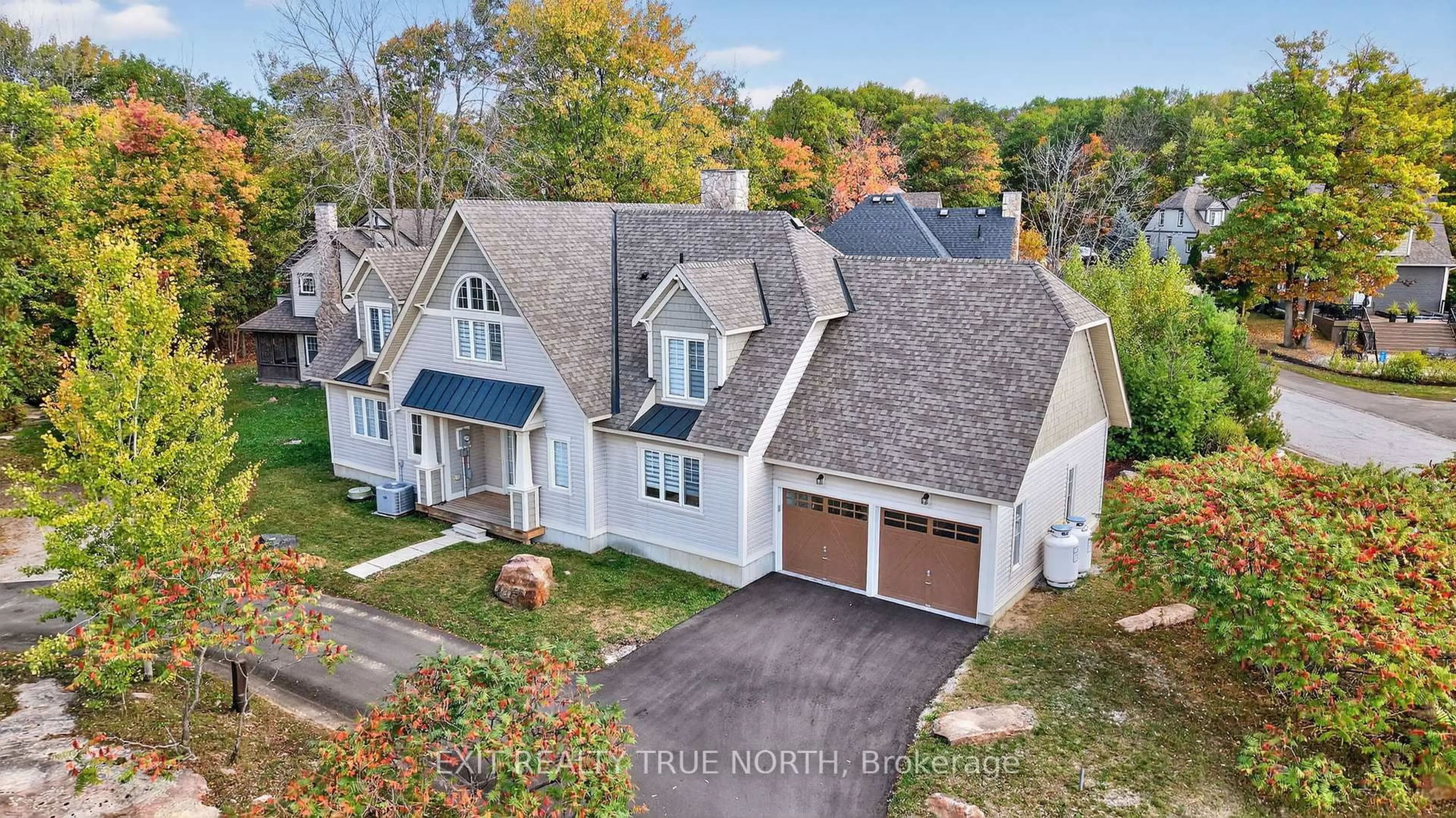 A pic from outside/outdoor area/front of a property/back of a property/a pic from drone, street for 4 Country Tr, Georgian Bay Ontario L0K 1S0
