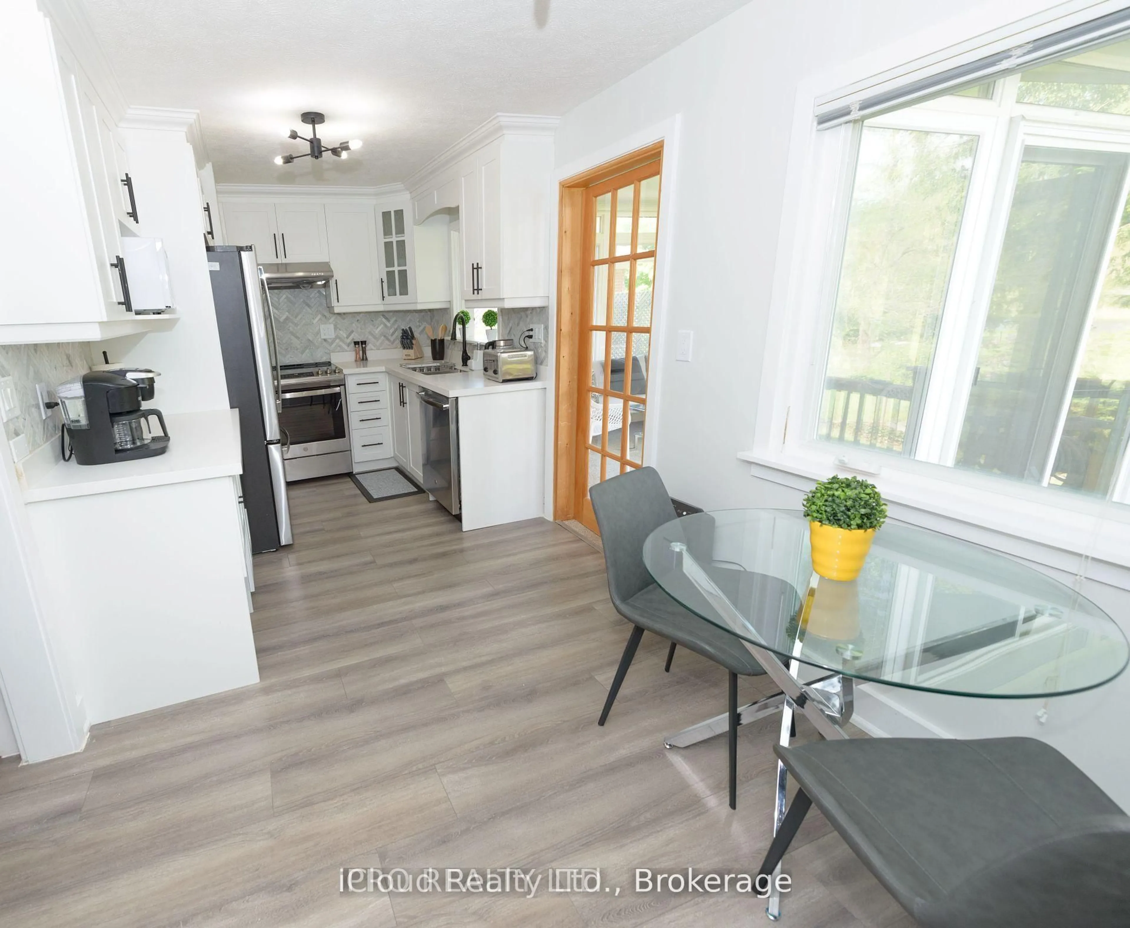 Open concept kitchen, wood/laminate floor for 245 2nd Ave, Owen Sound Ontario N4K 2E8