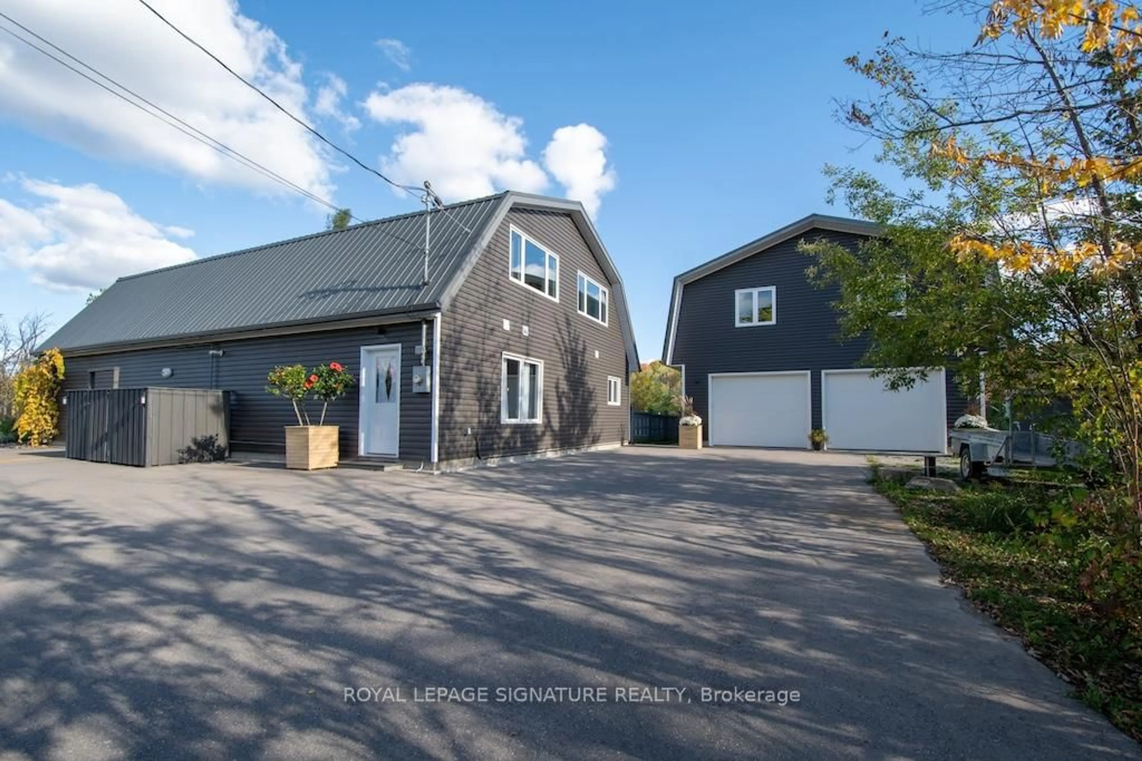 A pic from outside/outdoor area/front of a property/back of a property/a pic from drone, street for 10 Reid's Rd, Kawartha Lakes Ontario K0M 1L0