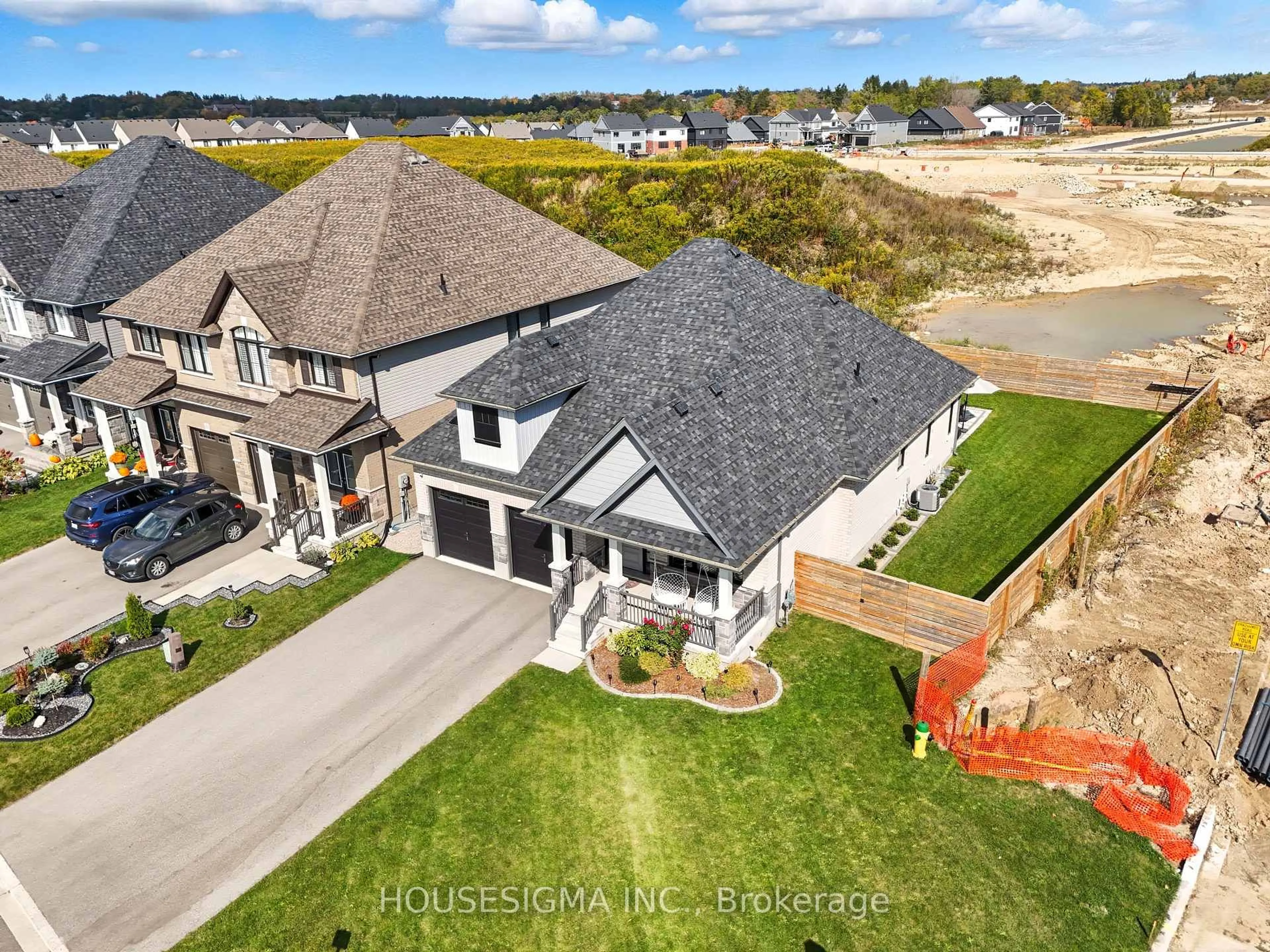 A pic from outside/outdoor area/front of a property/back of a property/a pic from drone, unknown for 106 Cutting Dr, Centre Wellington Ontario N0B 1S0