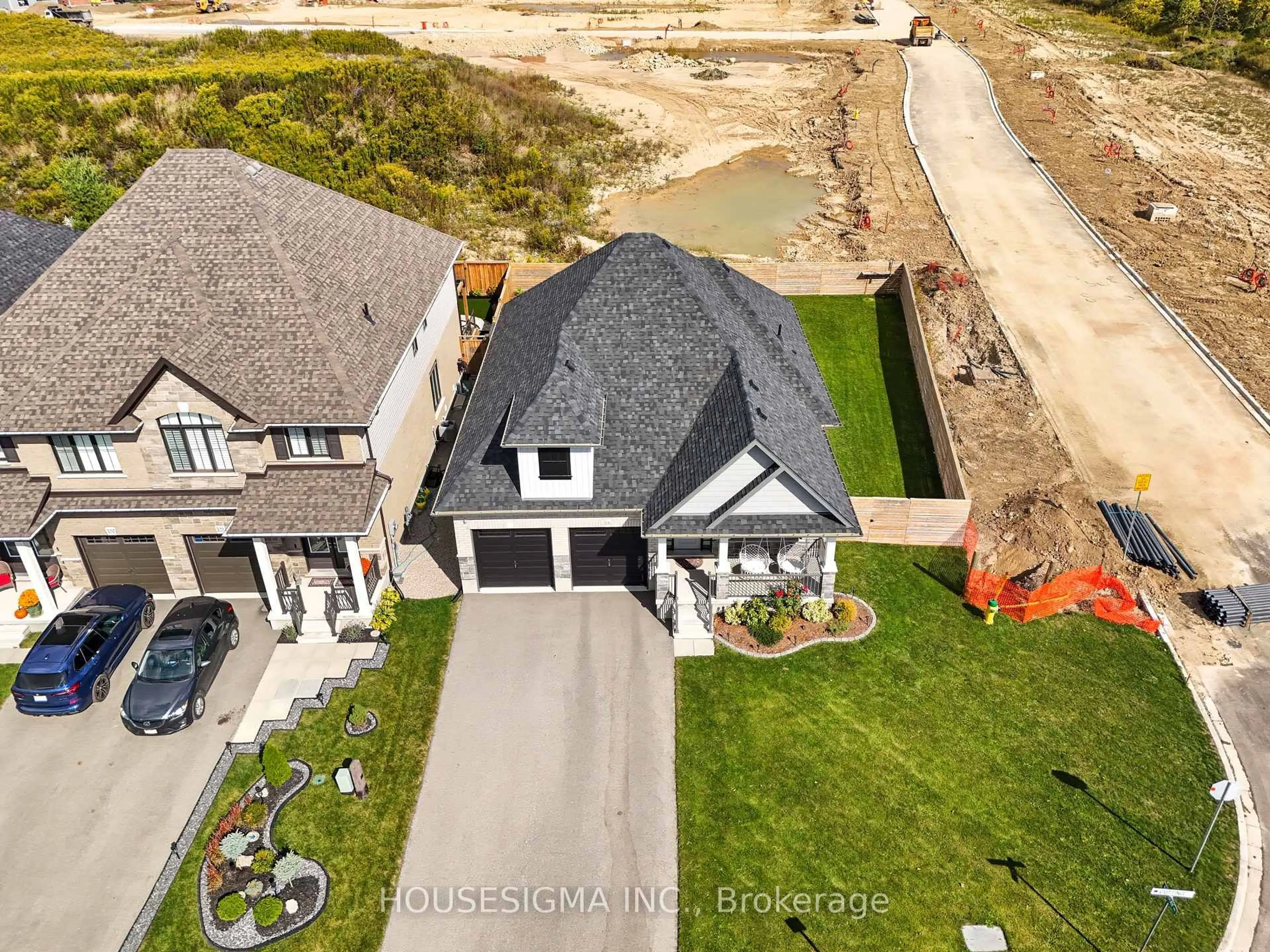 A pic from outside/outdoor area/front of a property/back of a property/a pic from drone, unknown for 106 Cutting Dr, Centre Wellington Ontario N0B 1S0