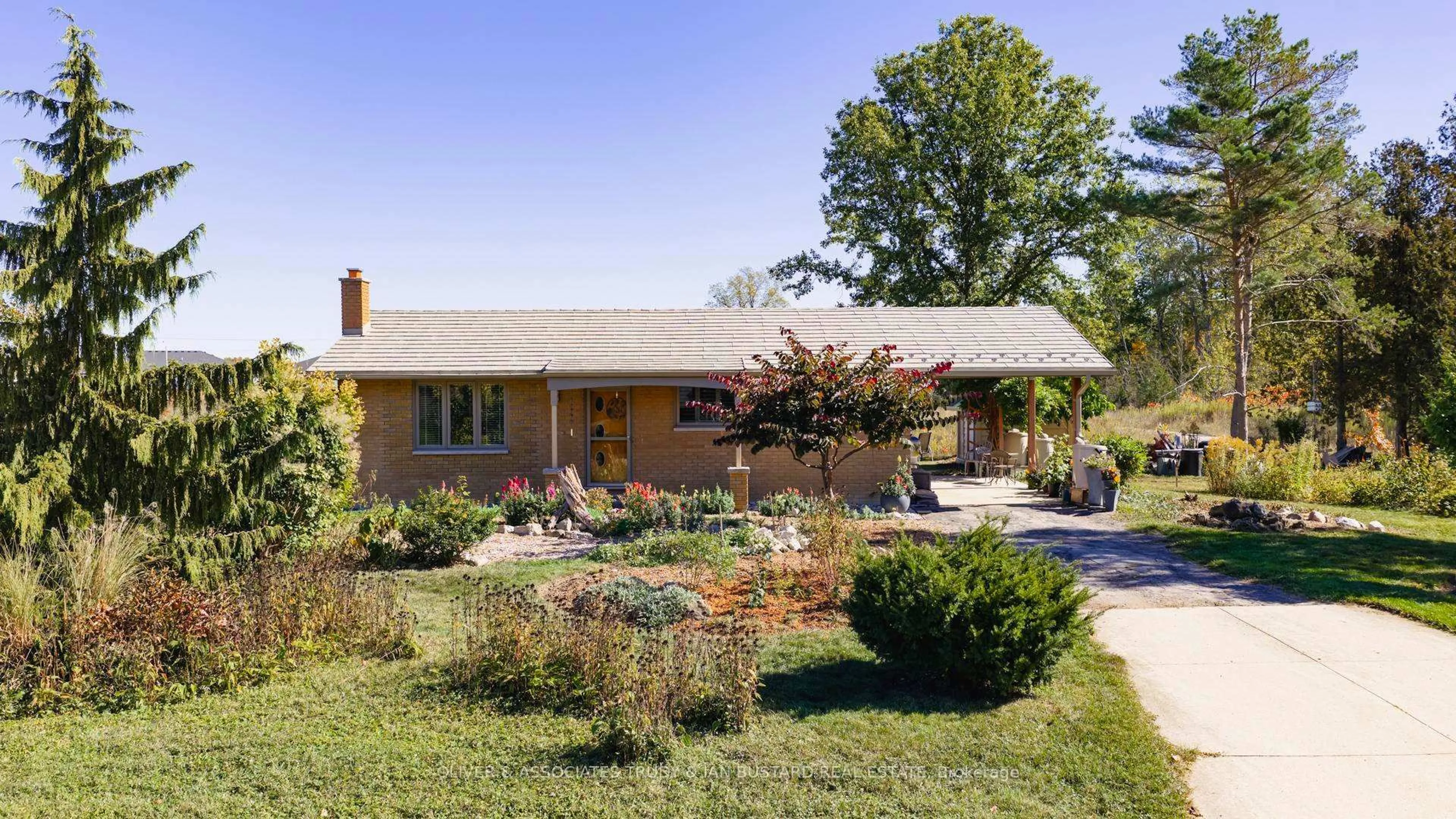 Home with brick exterior material, street for 52 Gill Rd Rd, Lambton Shores Ontario N0M 1T0