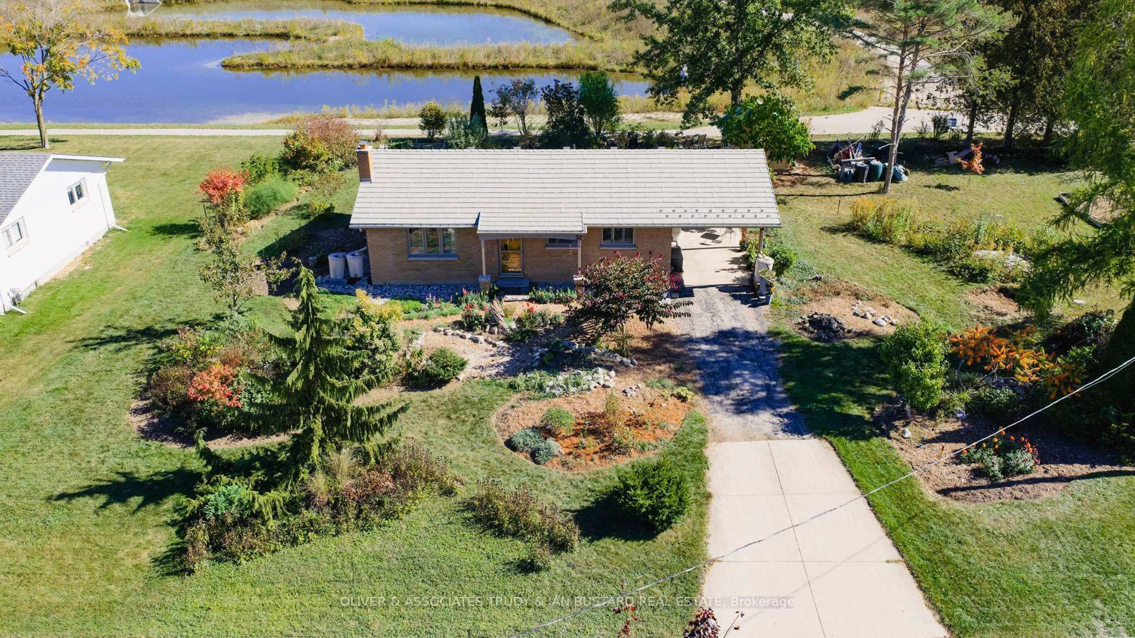 A pic from outside/outdoor area/front of a property/back of a property/a pic from drone, water/lake/river/ocean view for 52 Gill Rd Rd, Lambton Shores Ontario N0M 1T0