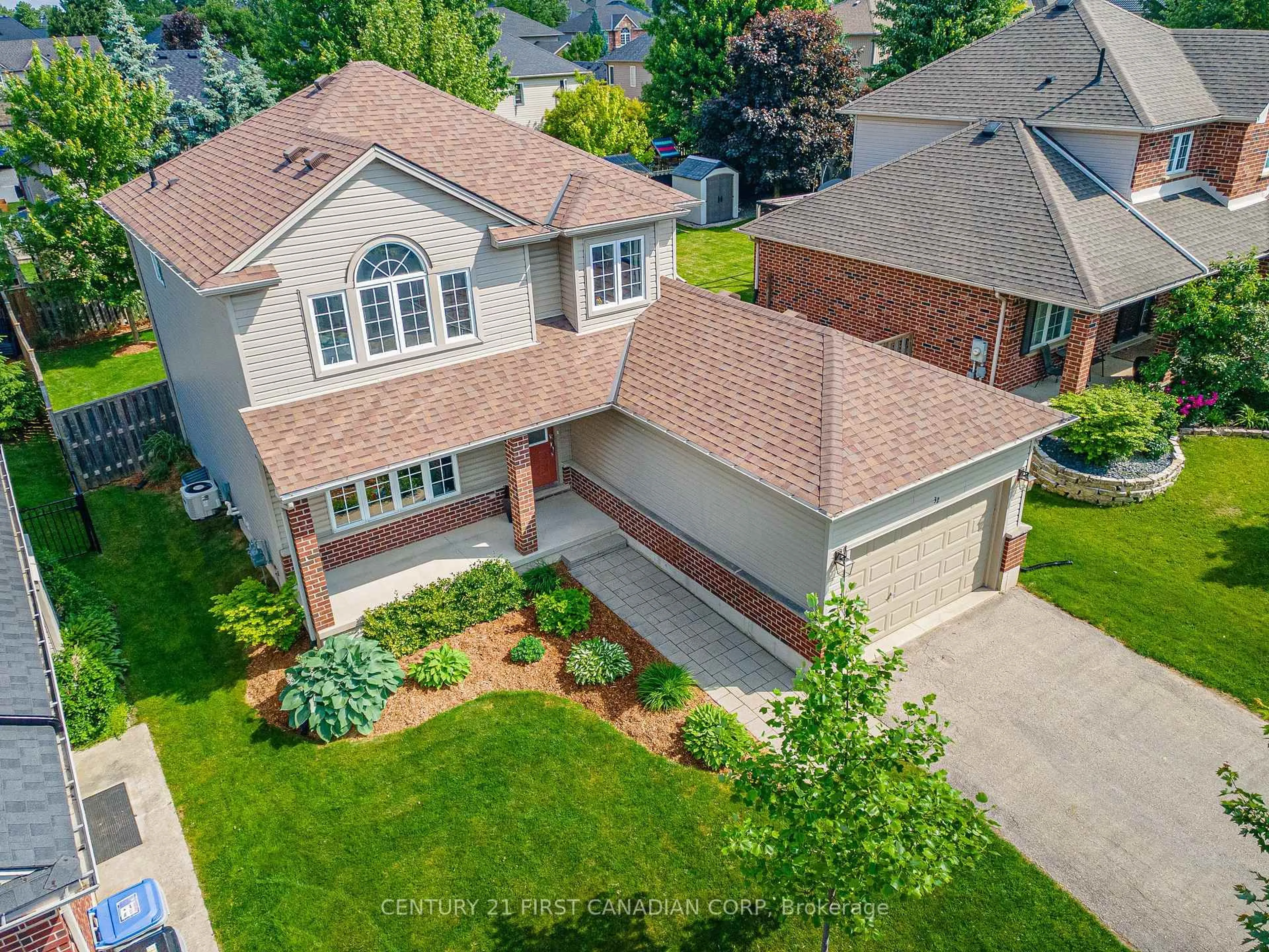 A pic from outside/outdoor area/front of a property/back of a property/a pic from drone, street for 32 Stone Field Lane, Middlesex Centre Ontario N0M 2A0
