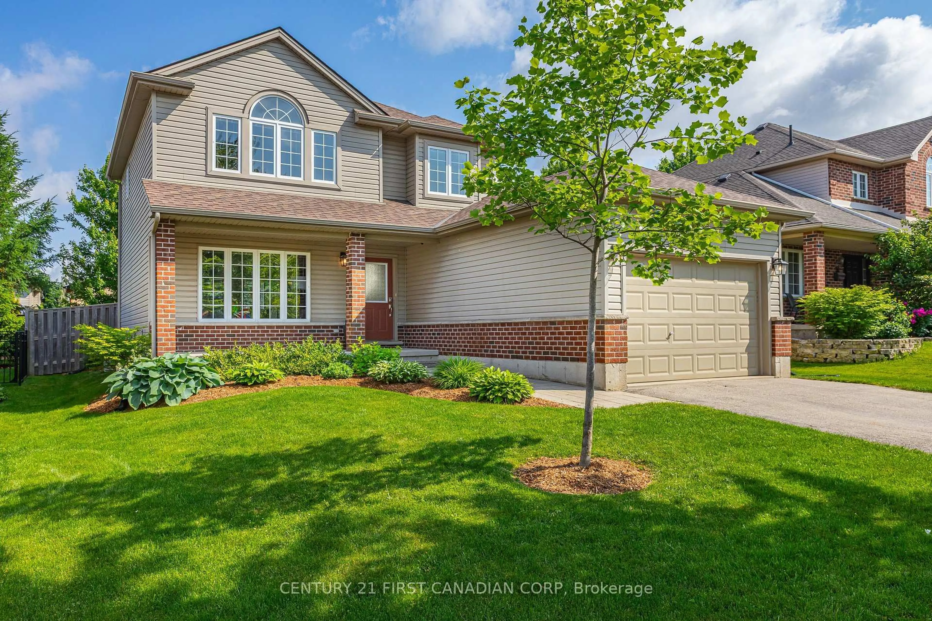 Home with brick exterior material, street for 32 Stone Field Lane, Middlesex Centre Ontario N0M 2A0