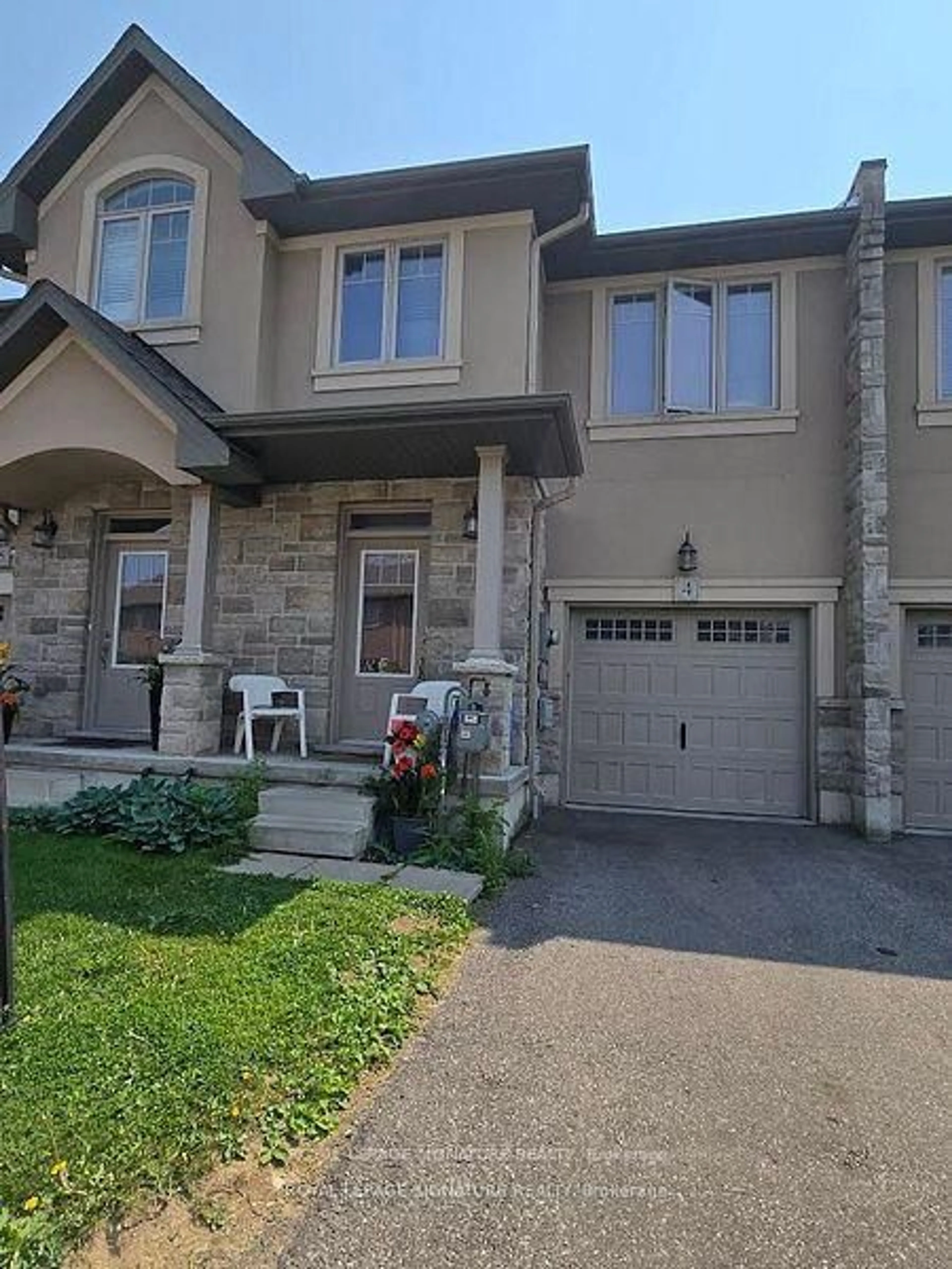 Home with brick exterior material, street for 98 Shoreview Pl #4, Hamilton Ontario L8E 0J4