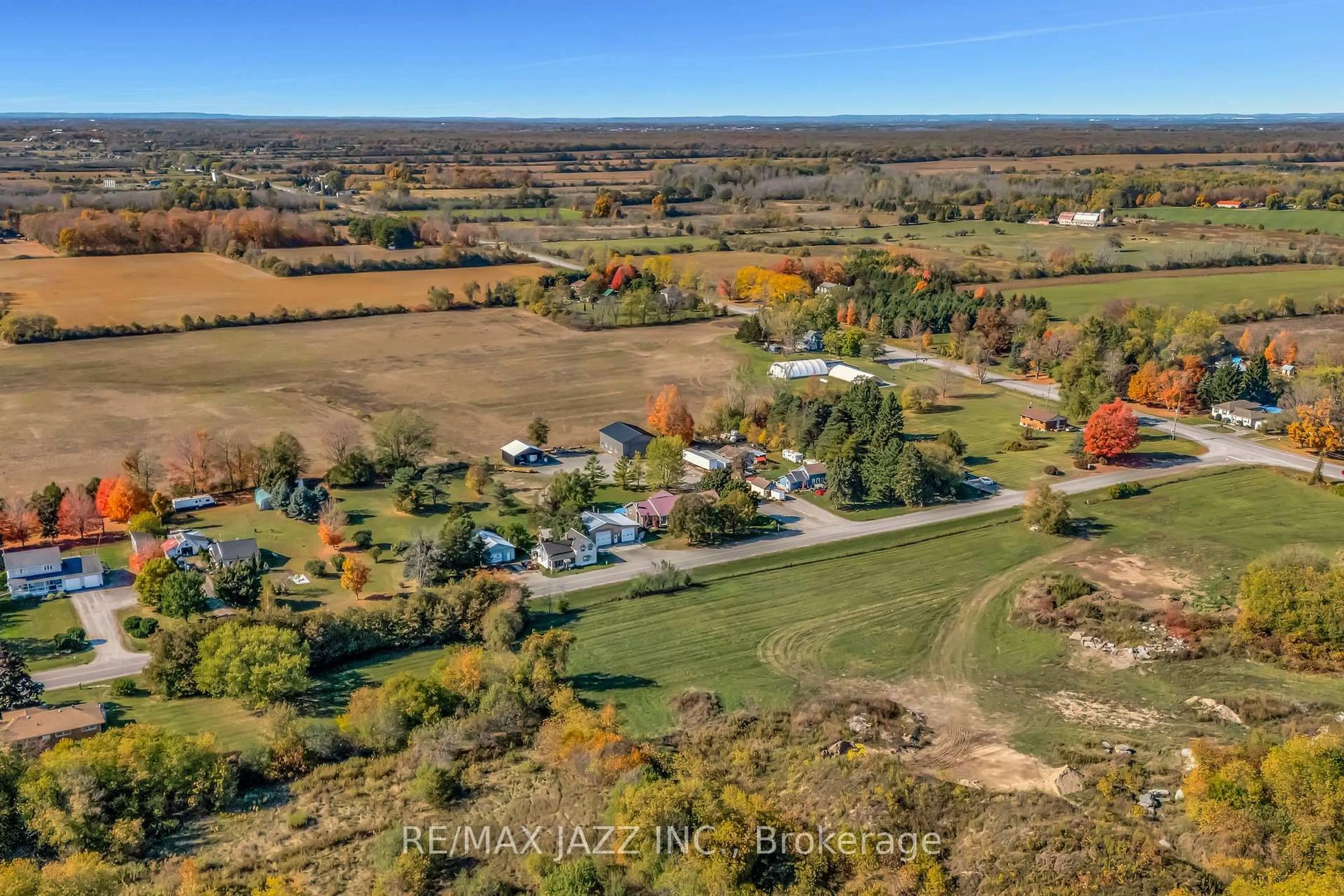 A pic from outside/outdoor area/front of a property/back of a property/a pic from drone, water/lake/river/ocean view for 325 County Rd 30 Rd, Prince Edward County Ontario K0K 1G0