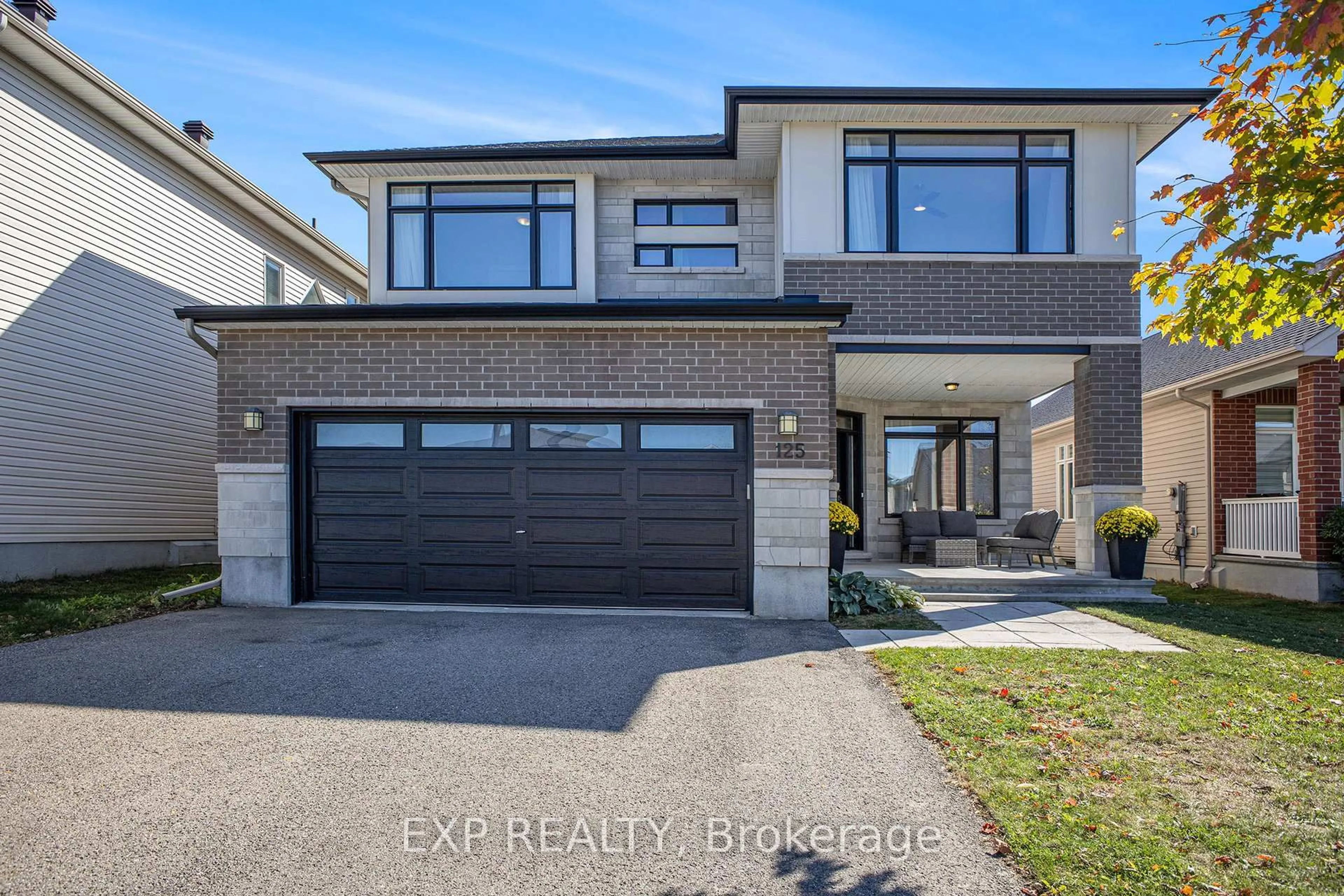 Home with brick exterior material, street for 125 Stonemeadow Dr, Ottawa Ontario K2M 0H5