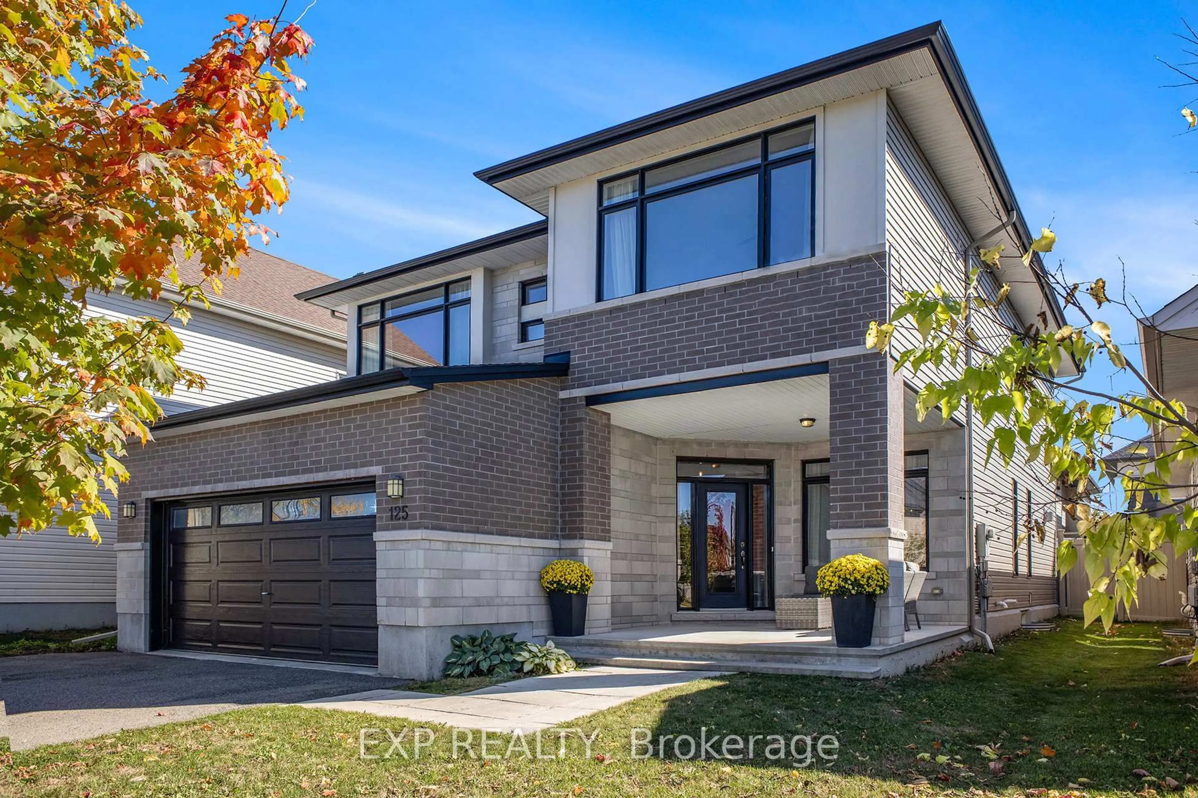 Home with brick exterior material, street for 125 Stonemeadow Dr, Ottawa Ontario K2M 0H5