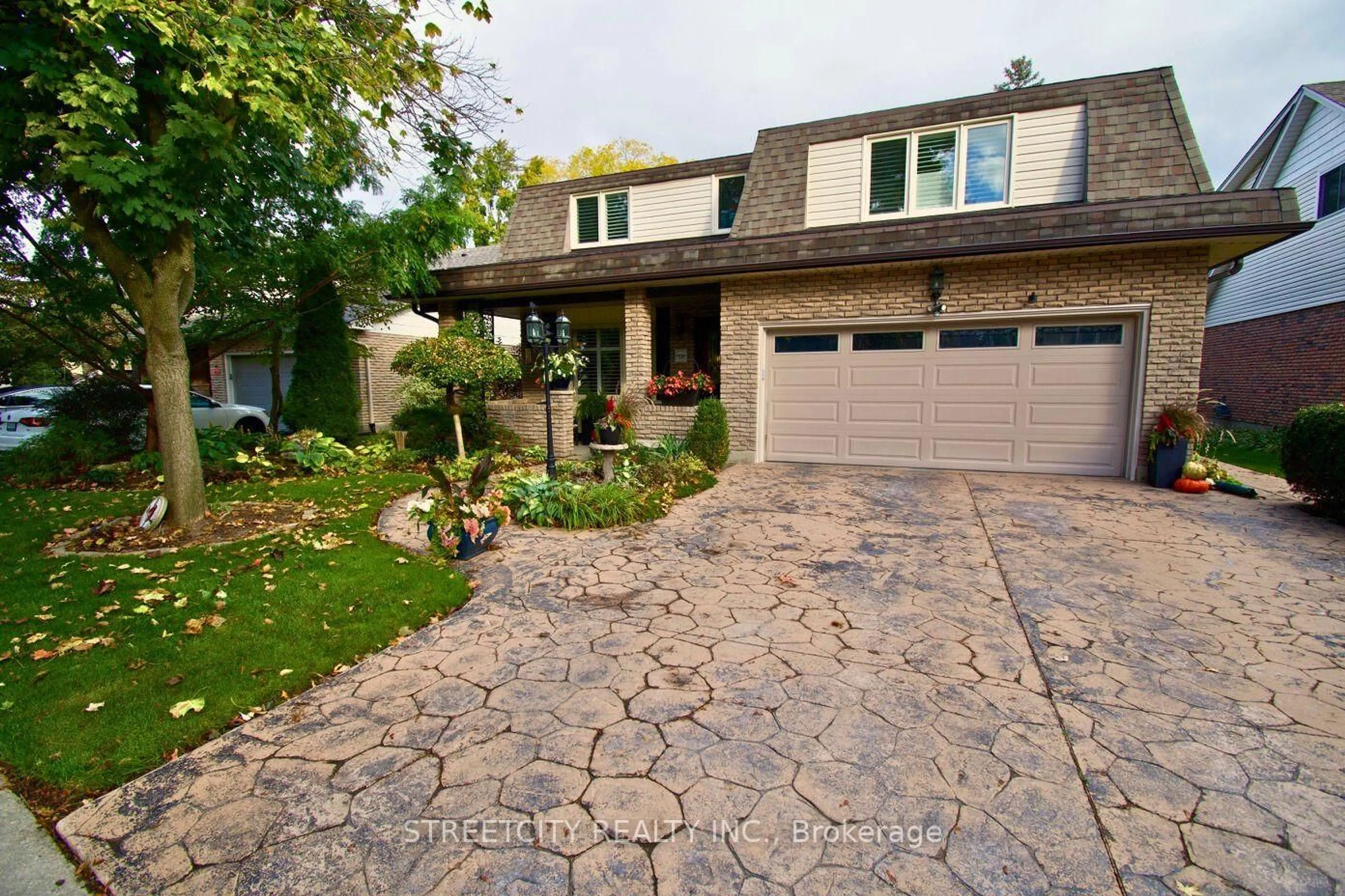 Home with brick exterior material, street for 138 Guildford Cres, London South Ontario N6J 3Y6