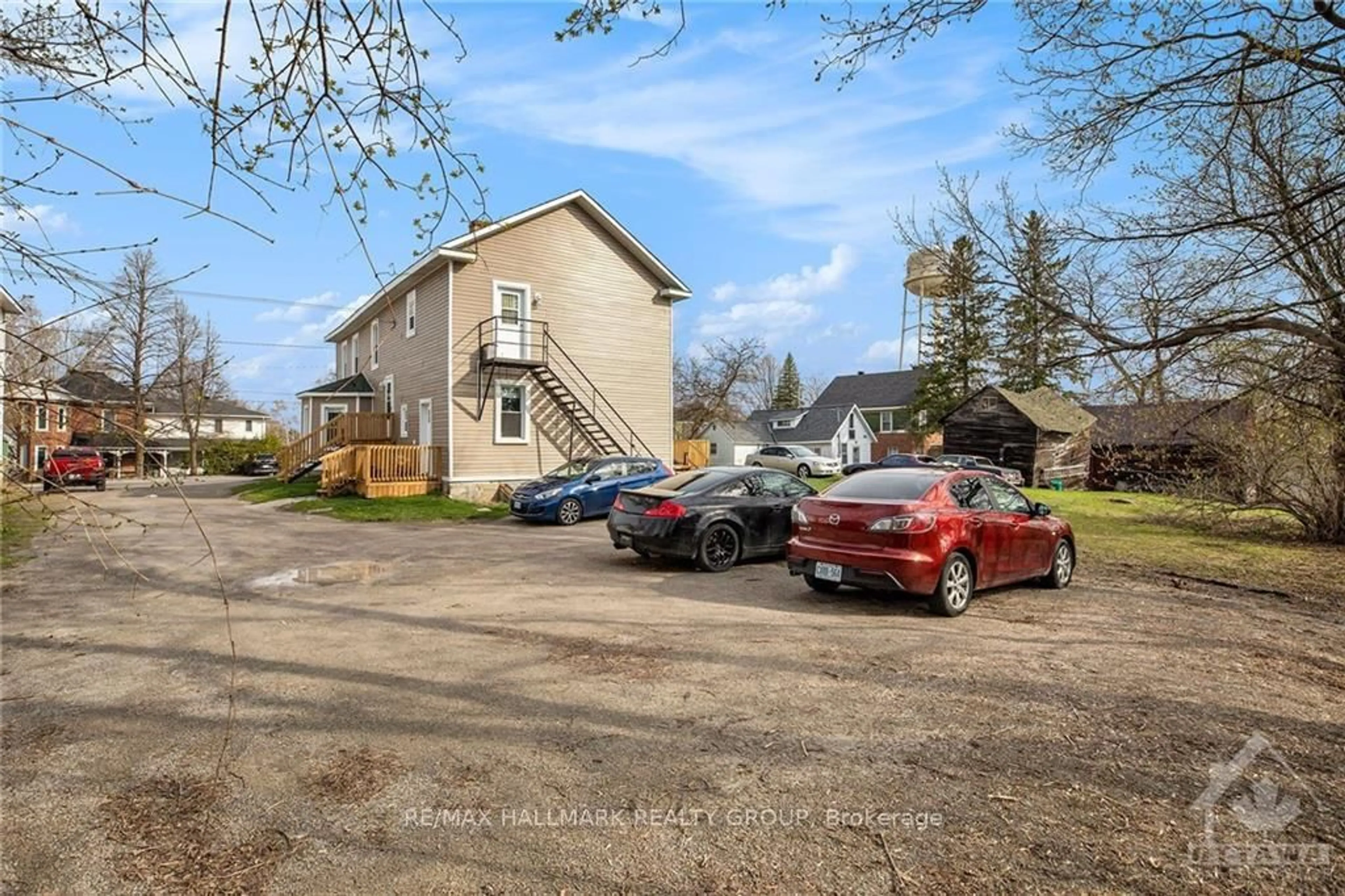 A pic from outside/outdoor area/front of a property/back of a property/a pic from drone, street for 58 Harvey St, Perth Ontario K7H 1W9