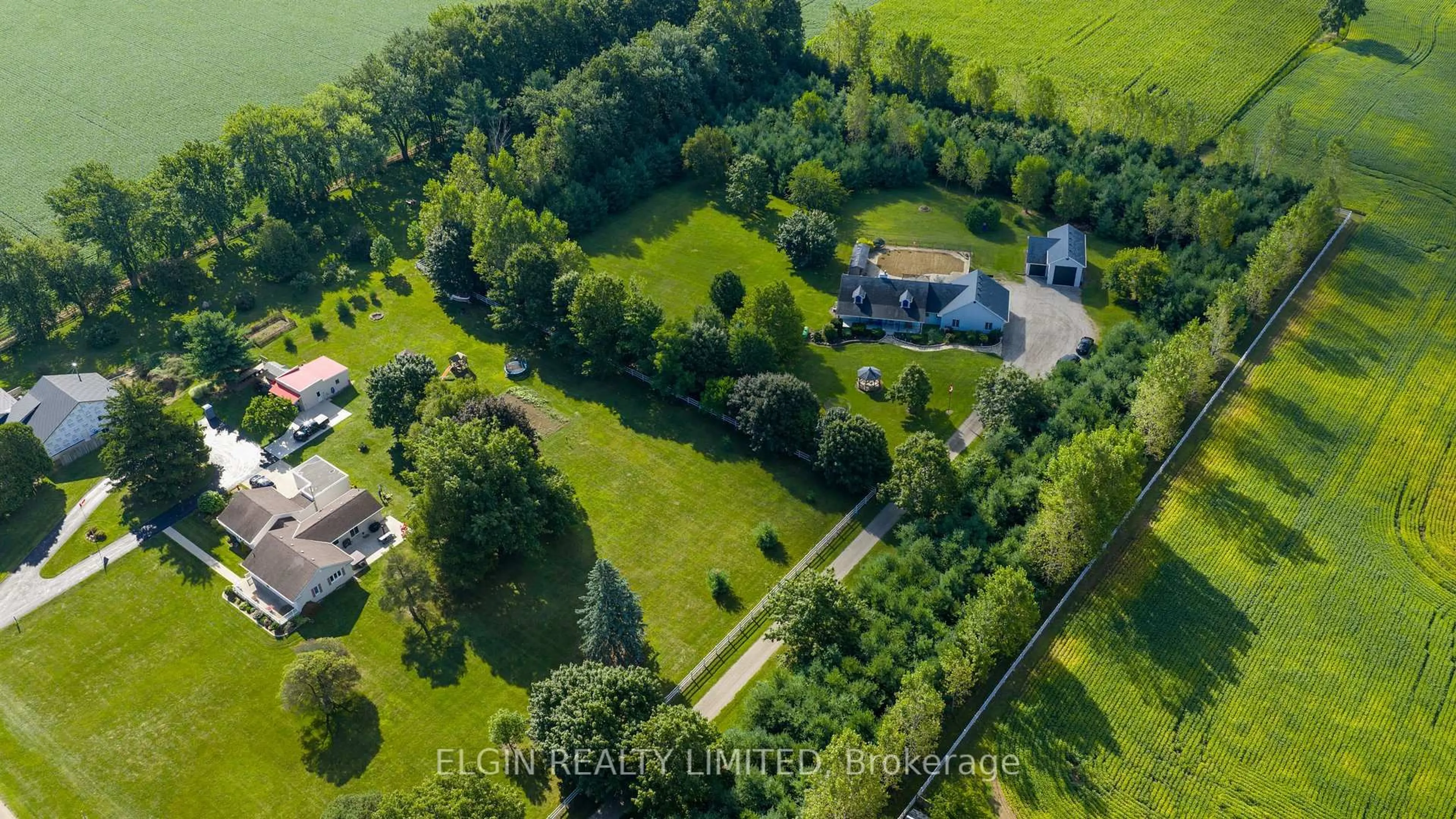 A pic from outside/outdoor area/front of a property/back of a property/a pic from drone, forest/trees view for 43053 John Wise Line, Central Elgin Ontario N5P 3S9