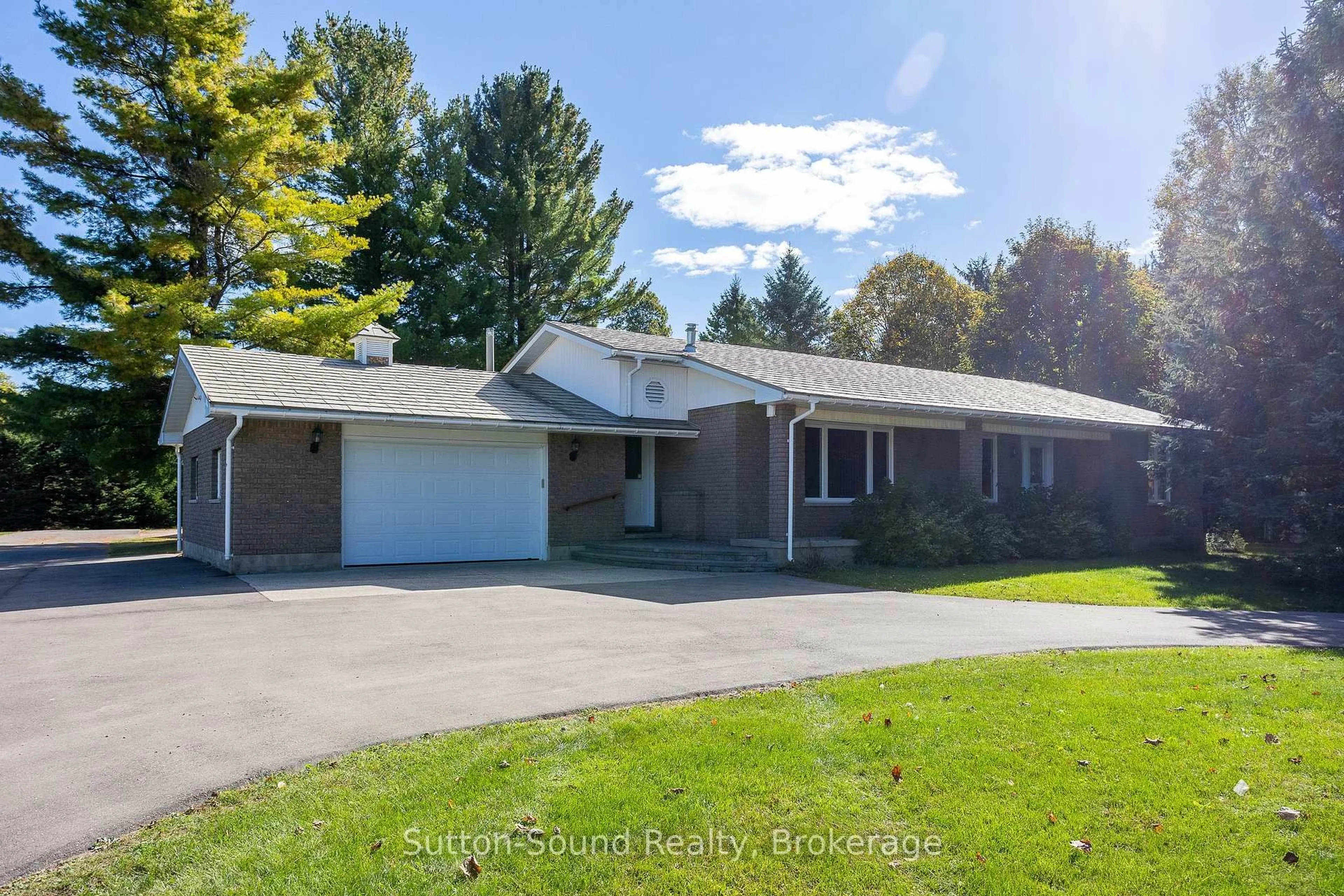 A pic from outside/outdoor area/front of a property/back of a property/a pic from drone, street for 340010 Stone School Rd, Georgian Bluffs Ontario N0H 2T0