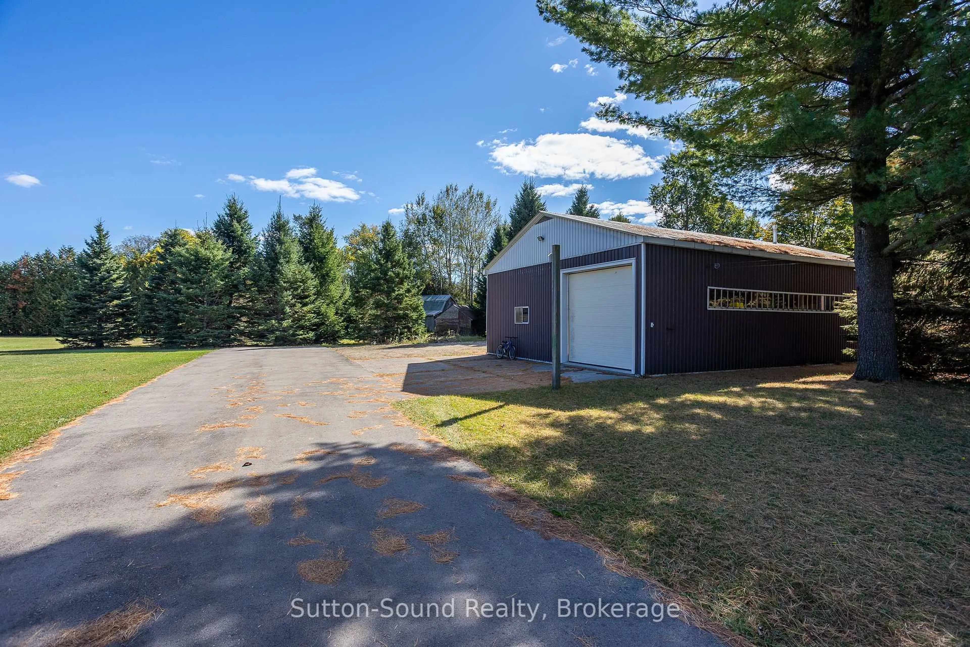 A pic from outside/outdoor area/front of a property/back of a property/a pic from drone, unknown for 340010 Stone School Rd, Georgian Bluffs Ontario N0H 2T0