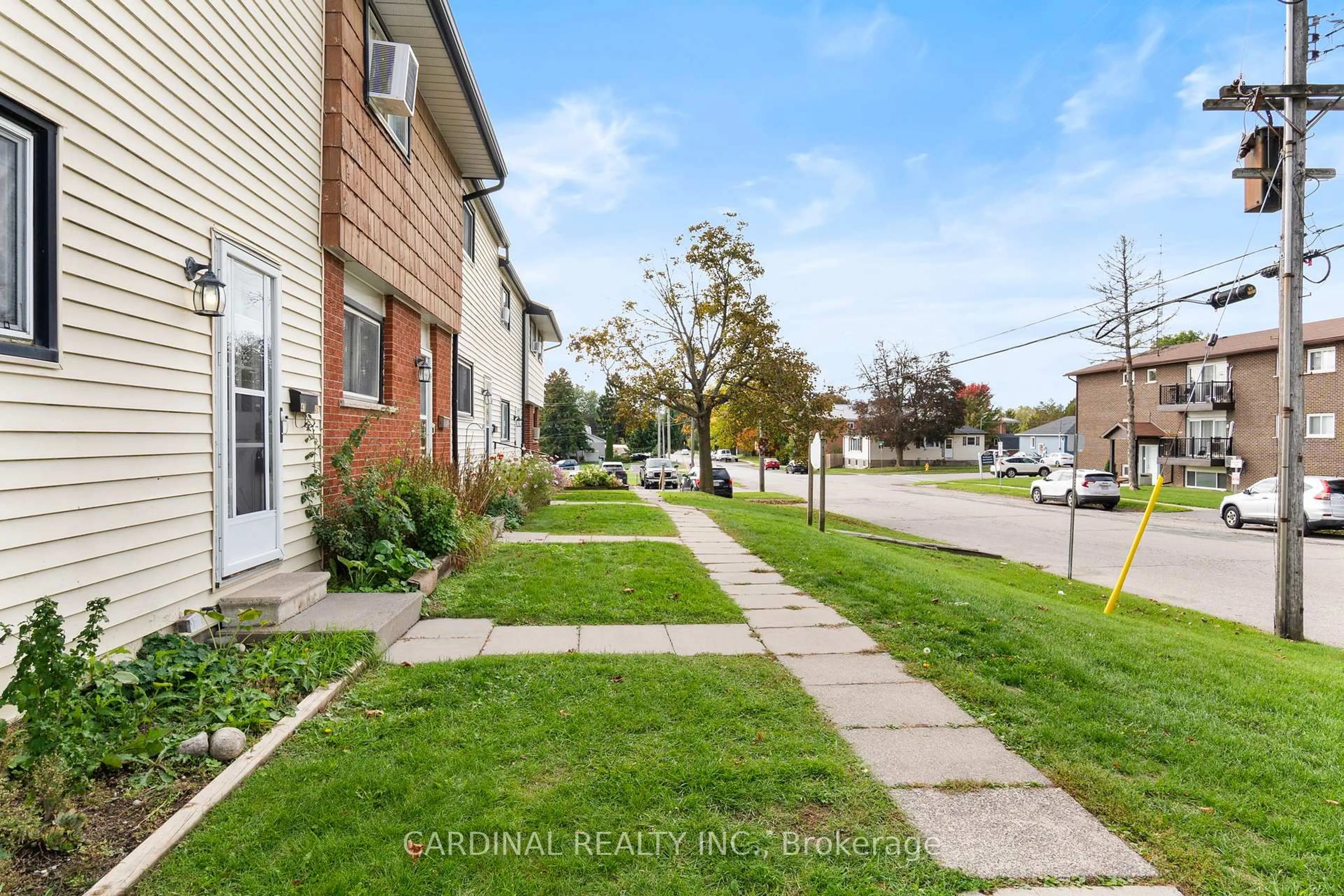 A pic from outside/outdoor area/front of a property/back of a property/a pic from drone, street for 47 Wellington St #A5 (Unit 1, Level 1), Port Hope Ontario L1A 2M4