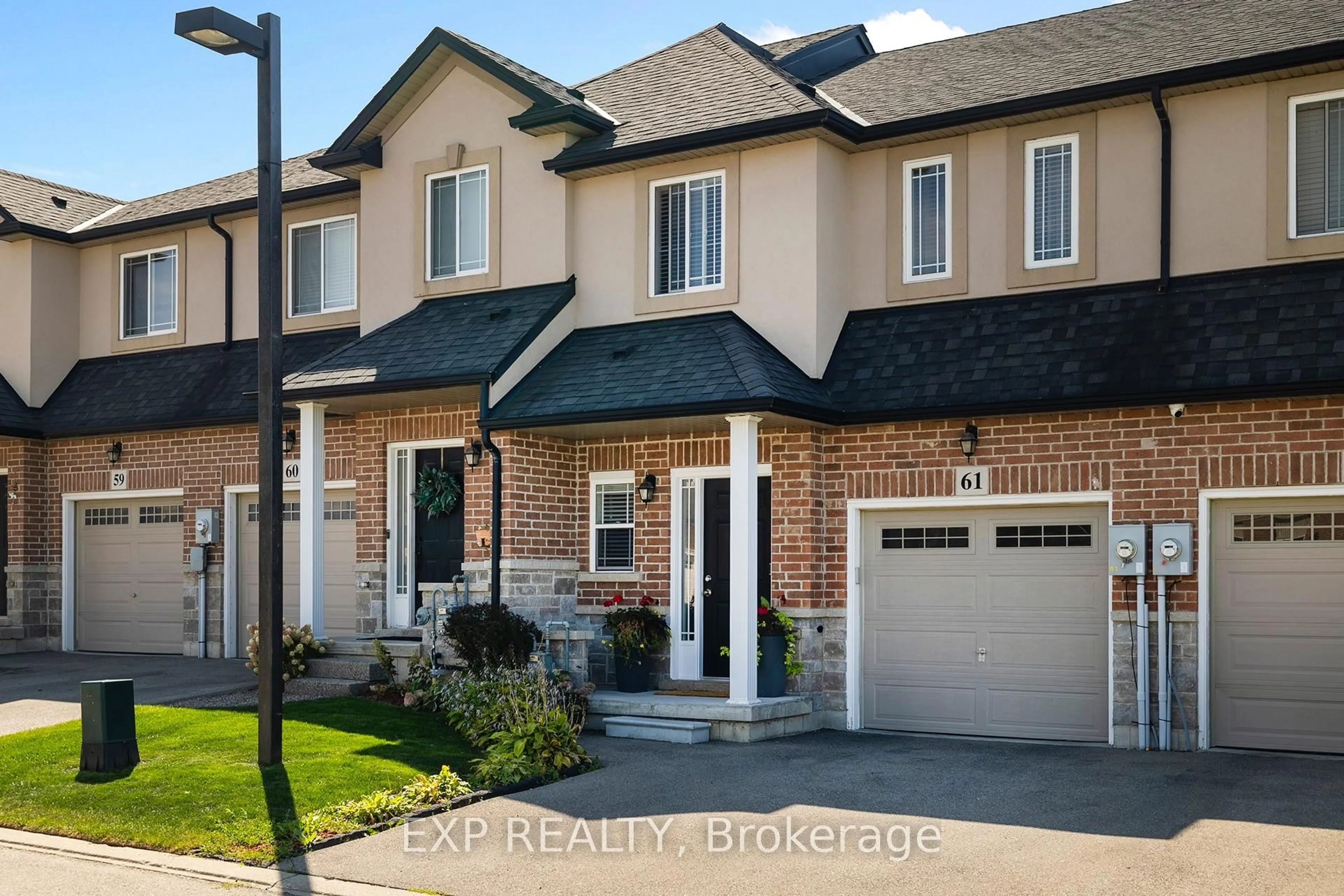 Home with brick exterior material, street for 9 Hampton Brook Way #61, Hamilton Ontario L0R 1W0