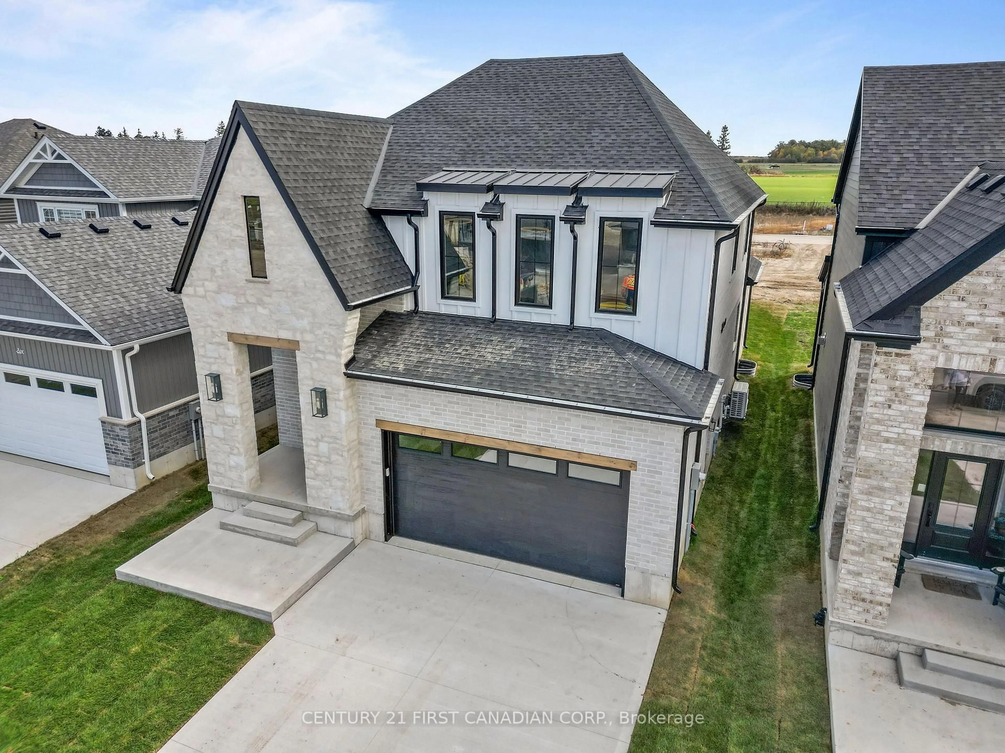 A pic from outside/outdoor area/front of a property/back of a property/a pic from drone, street for 8 Sheldabren St, North Middlesex Ontario N0M 1A0