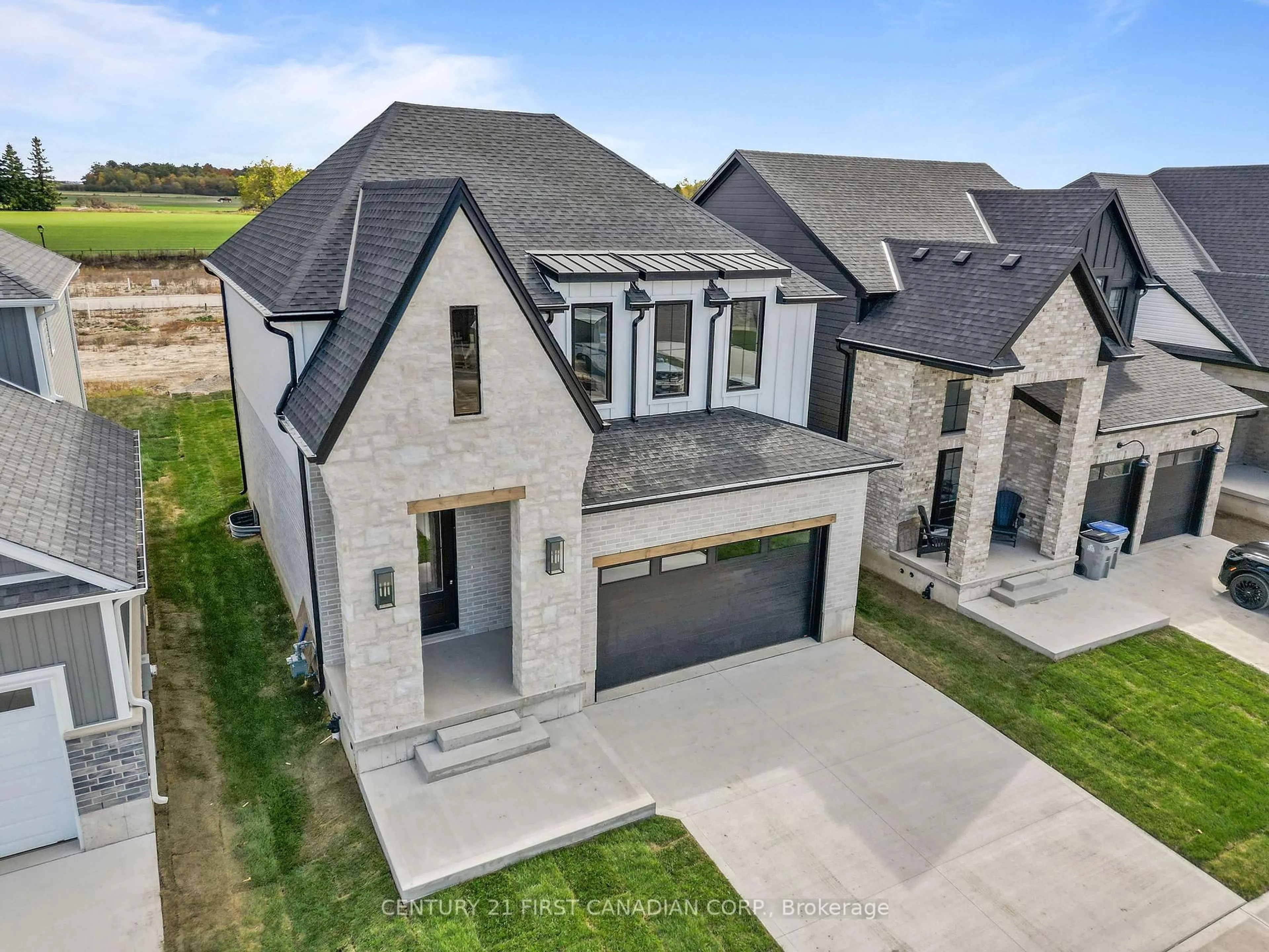 A pic from outside/outdoor area/front of a property/back of a property/a pic from drone, street for 8 Sheldabren St, North Middlesex Ontario N0M 1A0