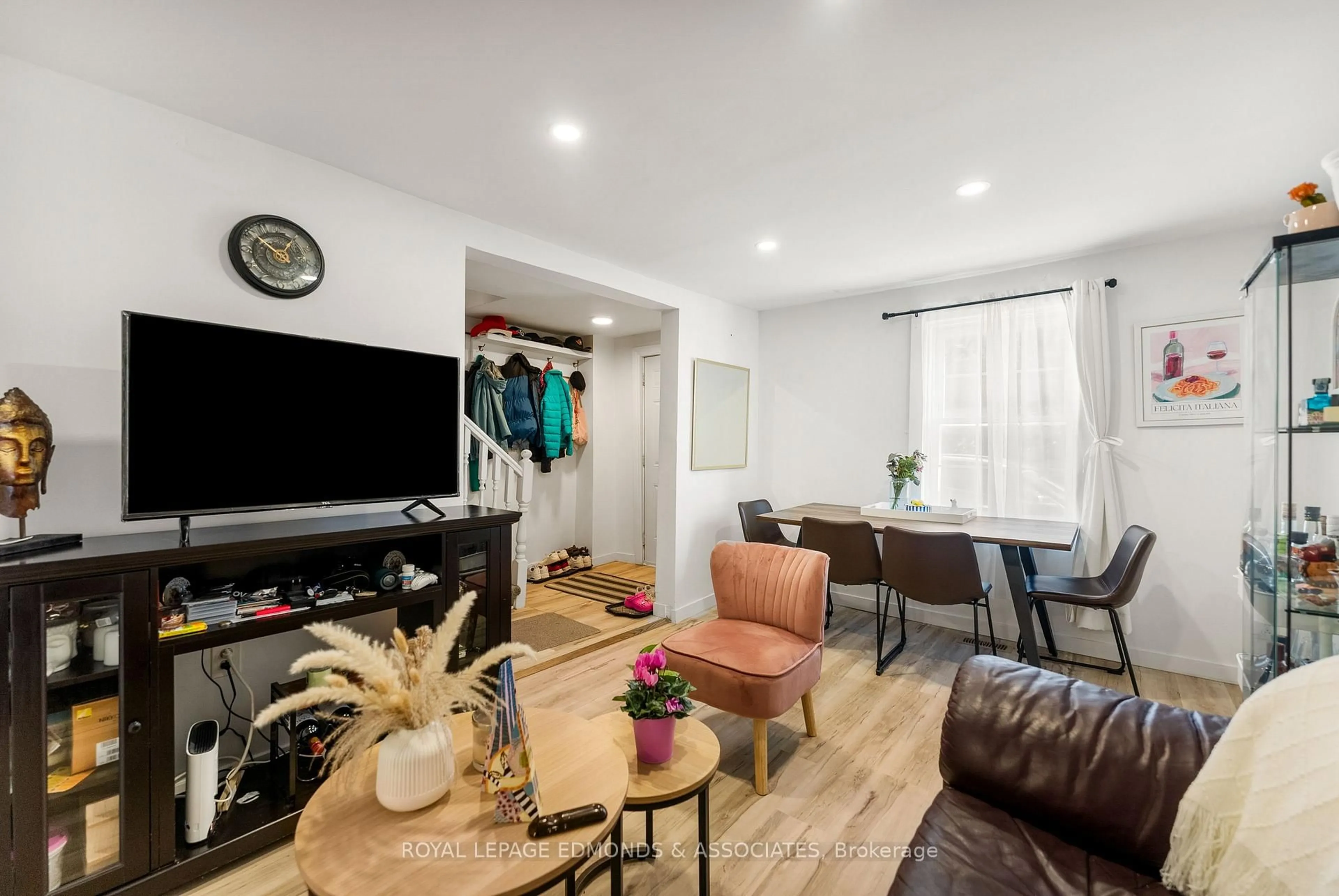 Living room with furniture, wood/laminate floor for 388 Murray St, Pembroke Ontario K8A 4P4