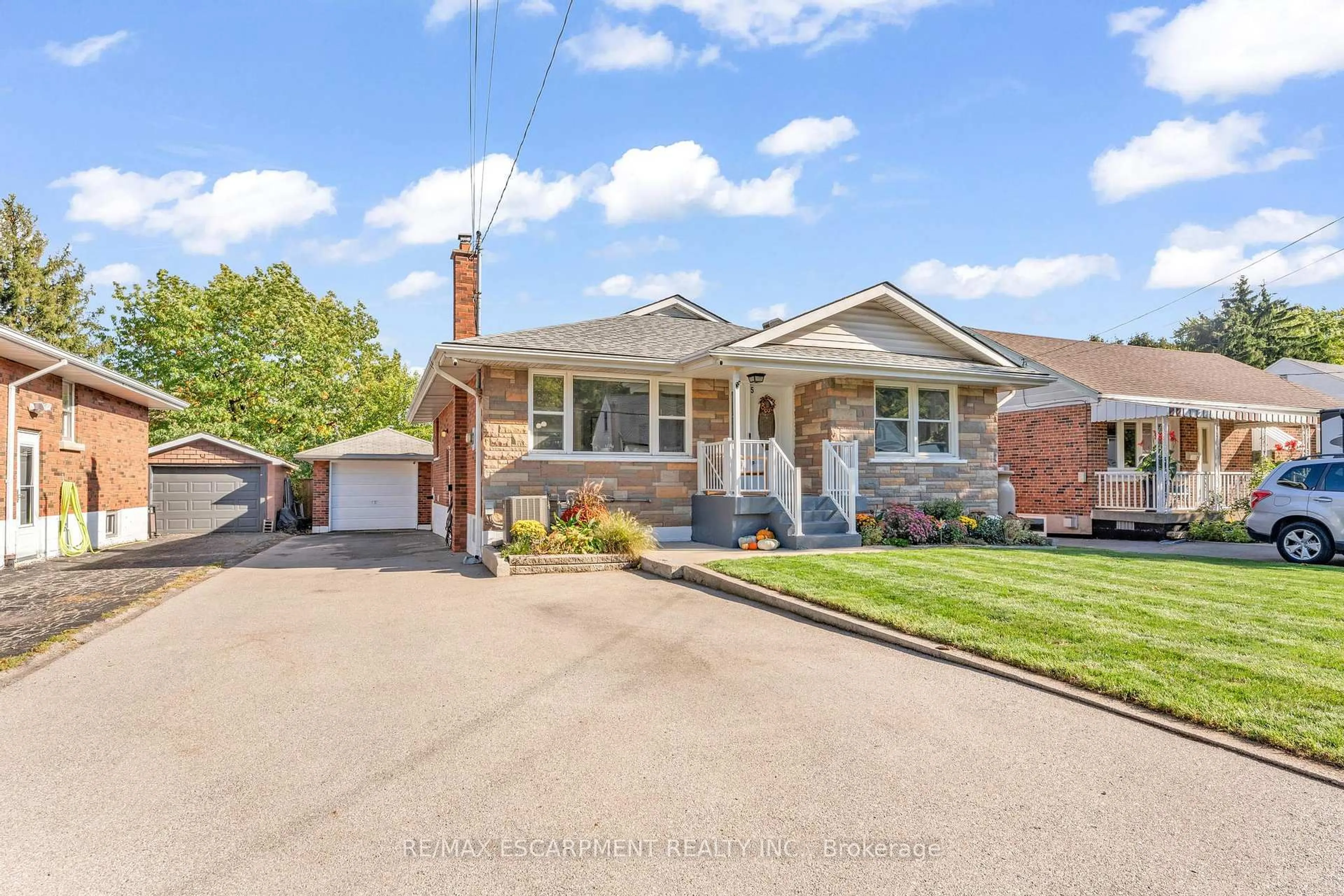 Home with brick exterior material, street for 75 Cloverdale Ave, Hamilton Ontario L8K 4M2
