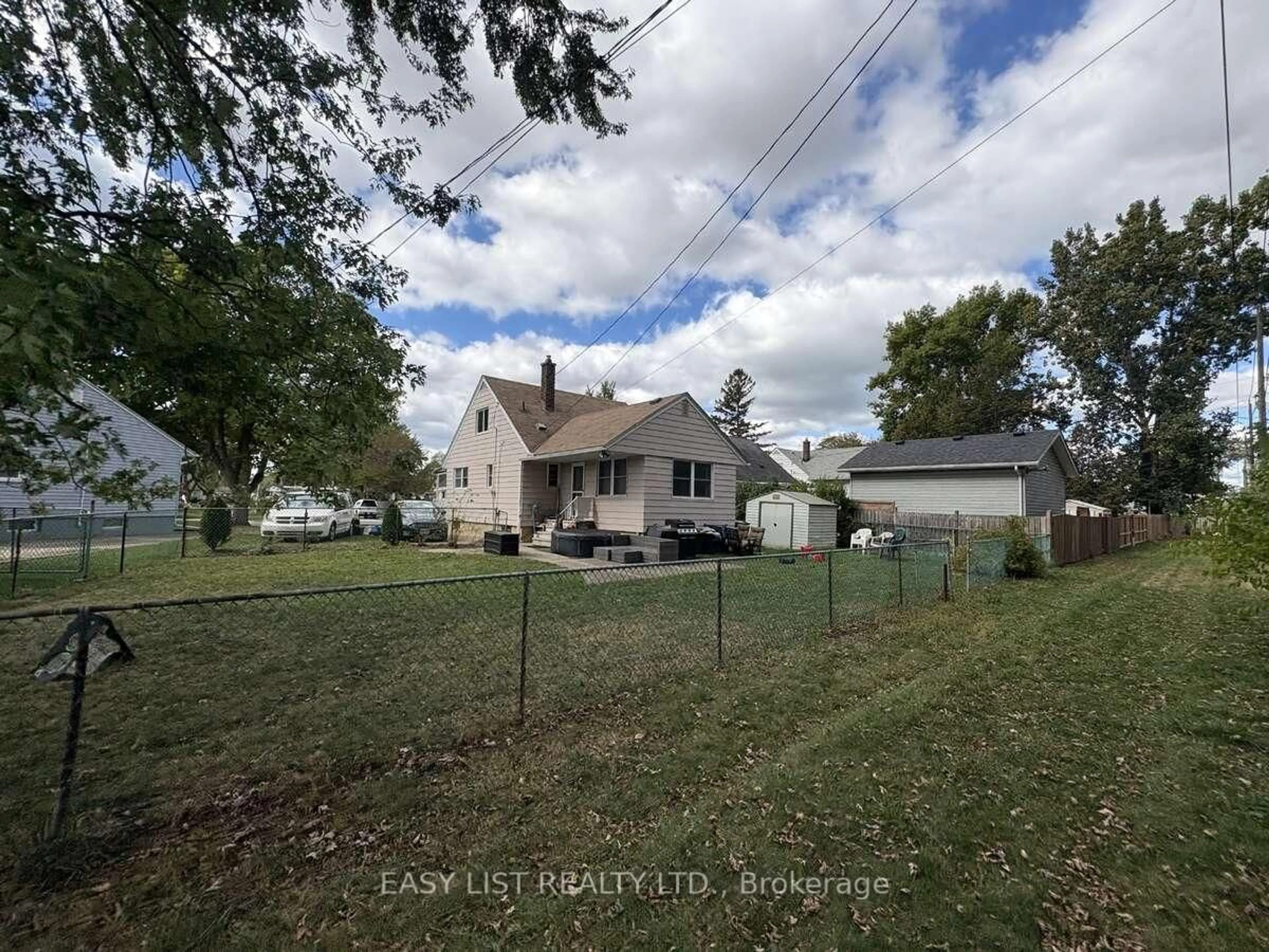 A pic from outside/outdoor area/front of a property/back of a property/a pic from drone, street for 1946 Malta Rd, Windsor Ontario N8W 4H4
