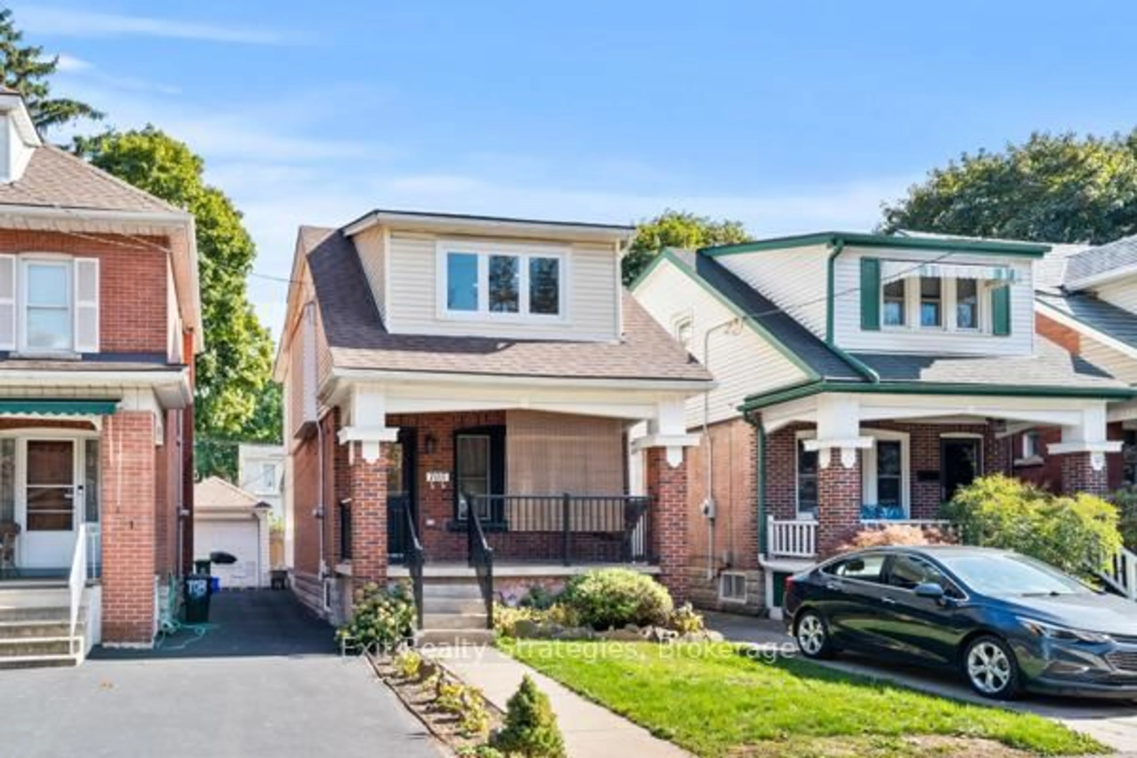 Home with brick exterior material, street for 105 Rothsay Ave, Hamilton Ontario L8M 3G3