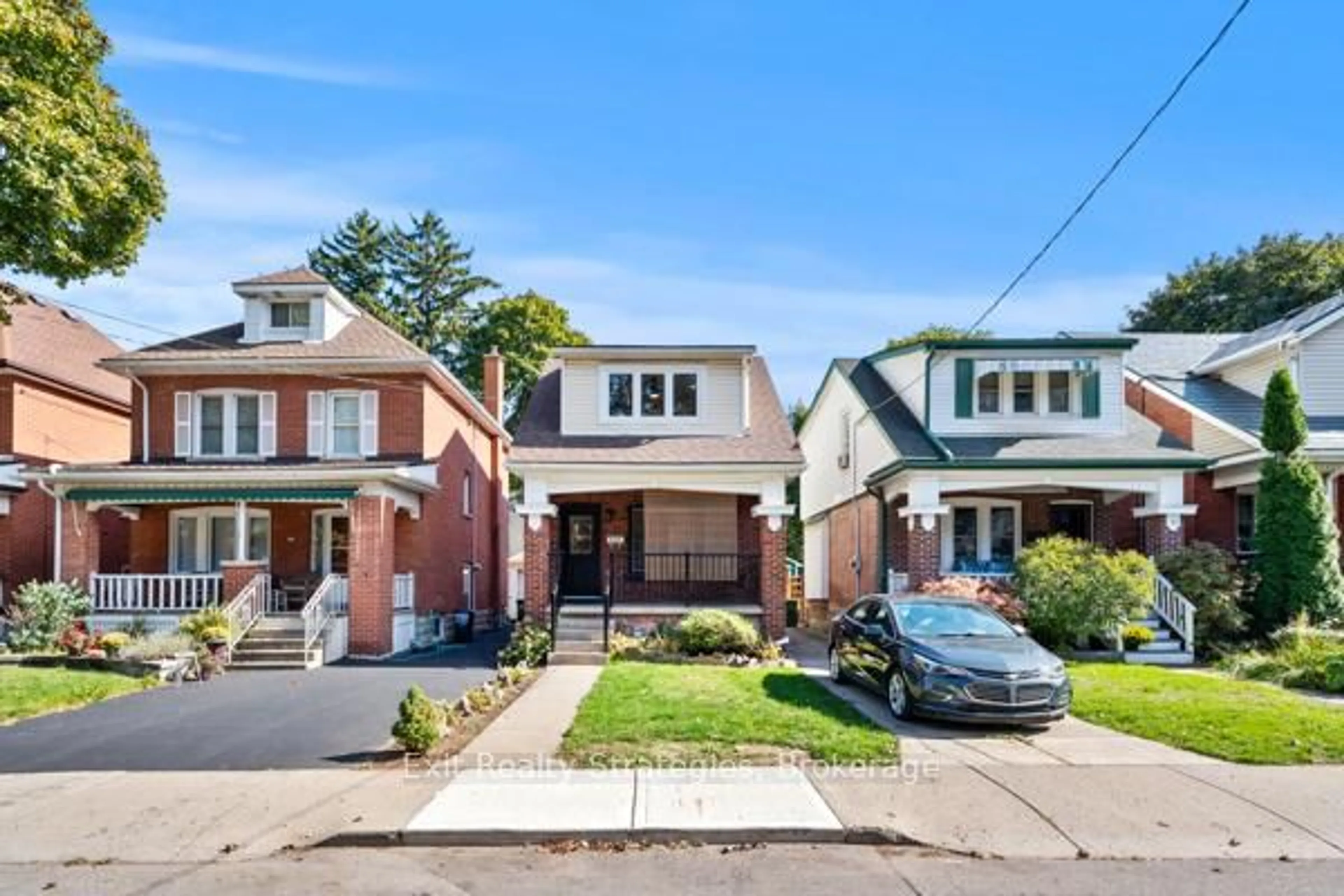 Home with brick exterior material, street for 105 Rothsay Ave, Hamilton Ontario L8M 3G3