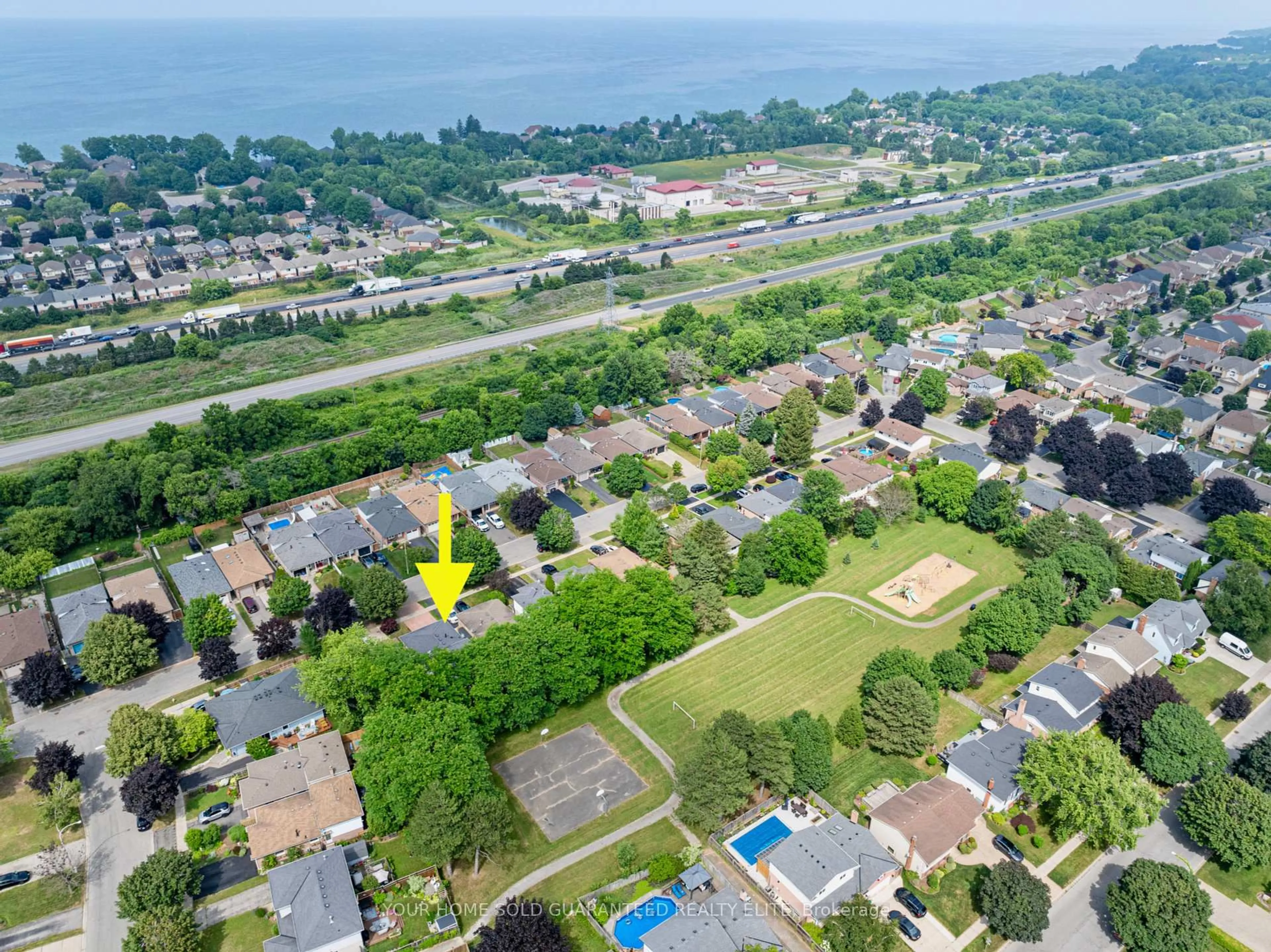 A pic from outside/outdoor area/front of a property/back of a property/a pic from drone, water/lake/river/ocean view for 57 Sandra Cres, Grimsby Ontario L3M 4Y5