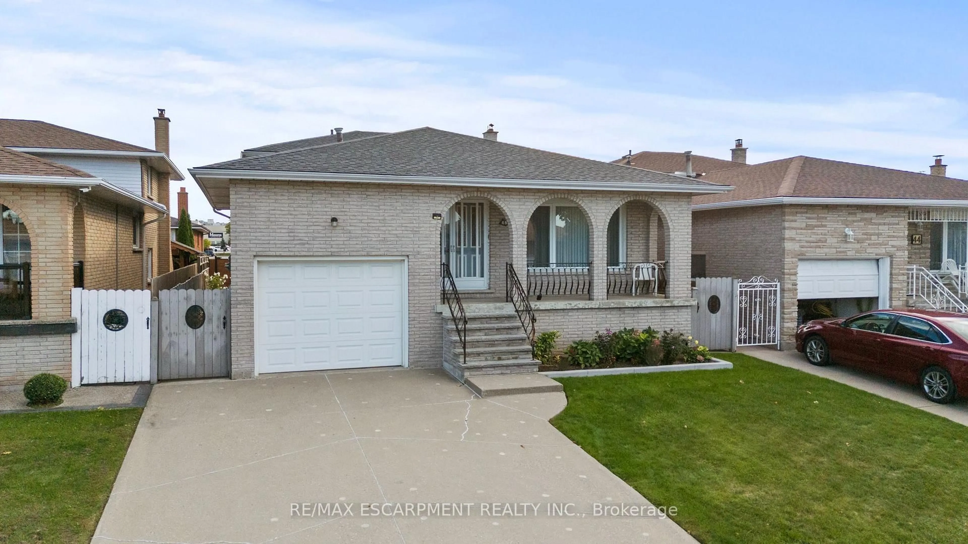 Home with vinyl exterior material, street for 48 Village Dr, Hamilton Ontario L8E 3N1